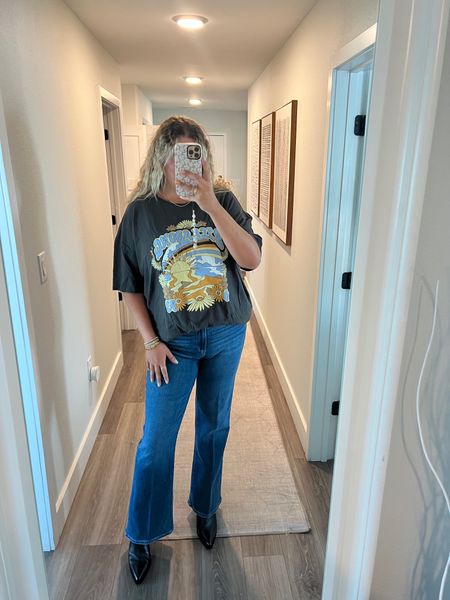 Flared denim jeans, black boots, graphic tee, Nashville outfit, country concert outfit, casual teacher outfit, Nordstrom anniversary sale 

#LTKxNSale #LTKshoecrush #LTKcurves