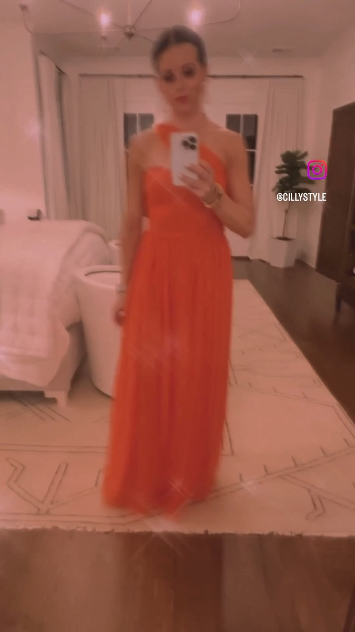 It’s #glam szn 
Gowns, cocktail dresses, and jumpsuits galore! 
Shopping for a dress can be daunting, but it can be fun too! 
If you think a color won’t look good on you, just try it! Orange is not in my color wheel but it is now! 
#ltk #ltkstyle #gala #fashion 
👇🏻
Follow @cillystyle on @shop.ltk and www.cillystyle.com 

#LTKSeasonal #LTKFind