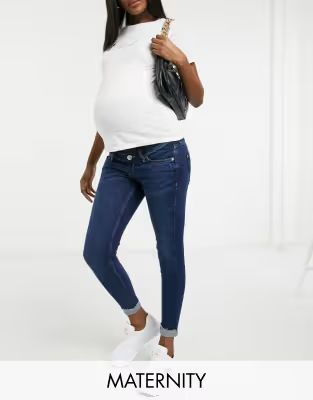 River Island Maternity Amelie overbump turnup skinny jeans in dark blue | ASOS (Global)