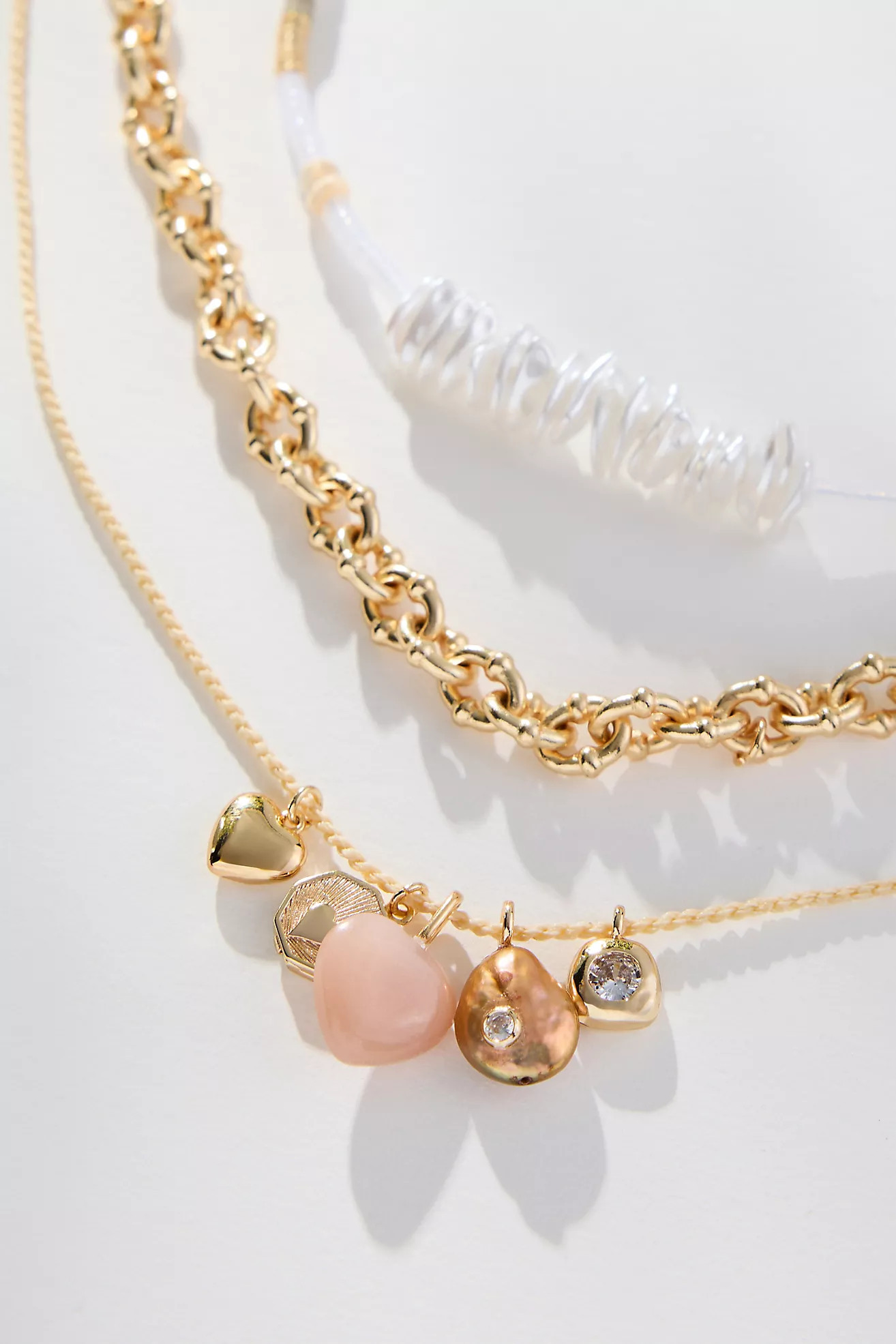 Shades of Sea Layered Necklaces: Charm Edition | Anthropologie (US)