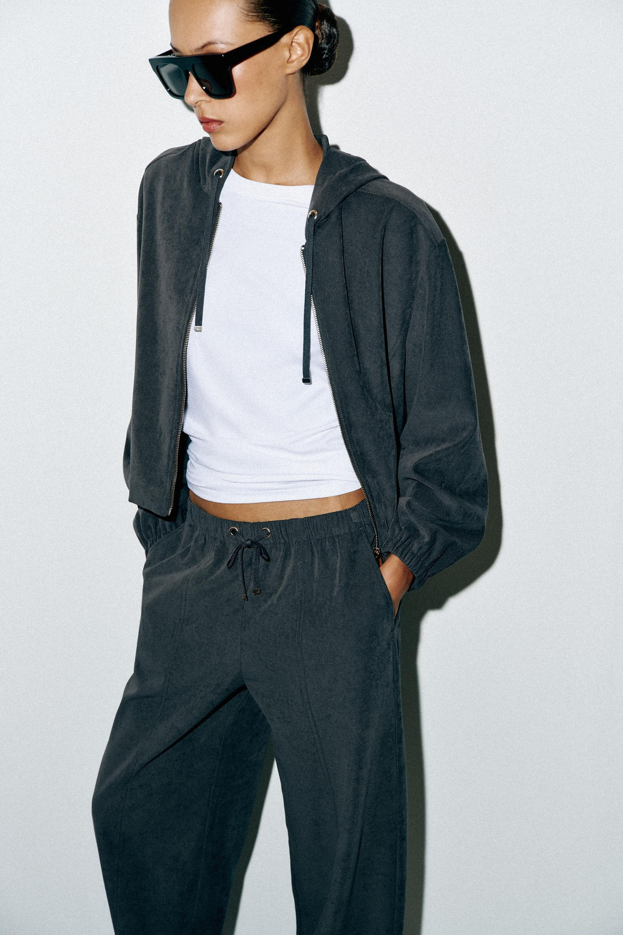 Bomber jacket featuring an adjustable hooded collar with drawstring and long sleeves with cuffs. ... | Zara US