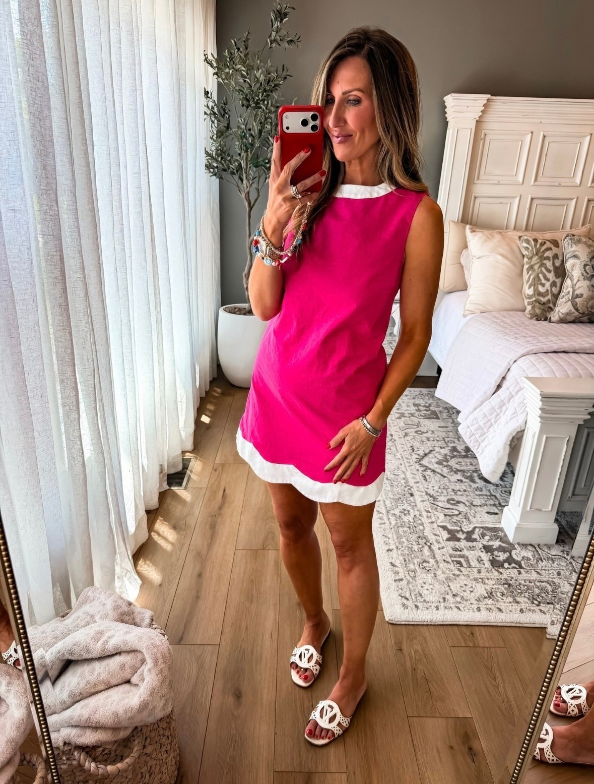 This pink shift dress is such a fun summer find. The bold color and contrasting white trim give it that classic resort feel, while the easy silhouette makes it comfortable enough to wear all day. Just add sandals and you’re ready for brunch, vacation, or any summer event on your calendar.

Pink shift dress, Summer dress, Resort wear, Vacation outfit, Bright pink dress, Classic style, Brunch outfit, Preppy fashion, Colorful summer outfit, Beach vacation style, Casual chic outfit, Statement dress, TheMomInStyle

#LTKTravel #LTKOver40 #LTKootd