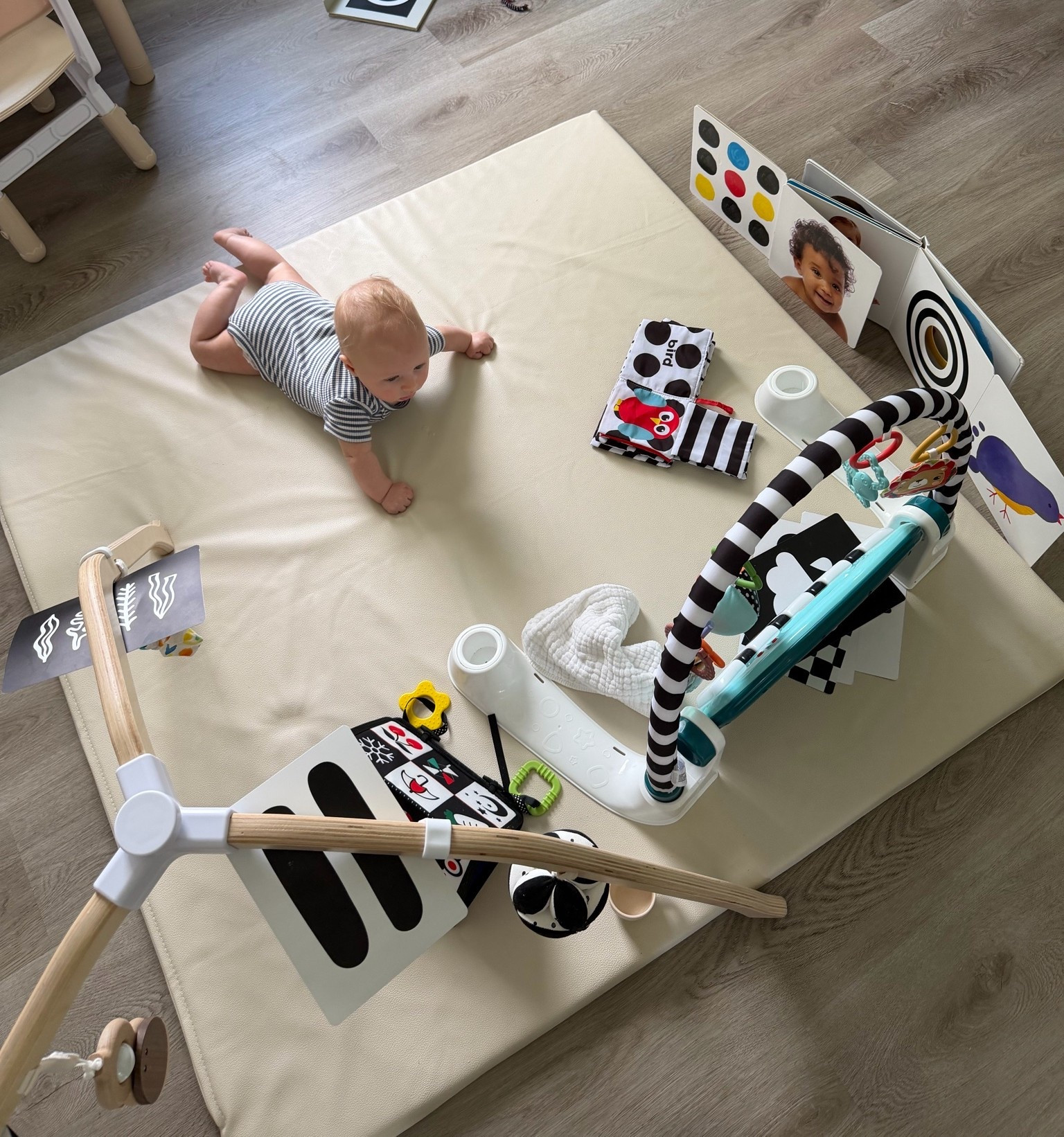 Crew’s little play setup. He loves smiling at the babies in his tummy time book, watching the lights, and smacking the black and white ball.

Baby play gym
Play mat
Lovevery

#LTKBaby #LTKBump #LTKmomlife