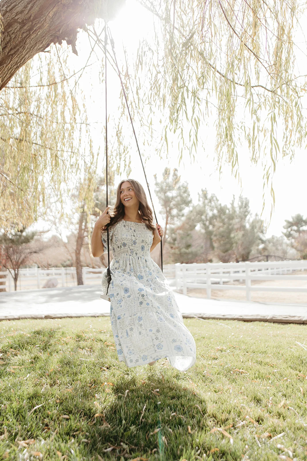 THE LUNA FLORAL SMOCKED DRESS IN BLUE | Pink Desert