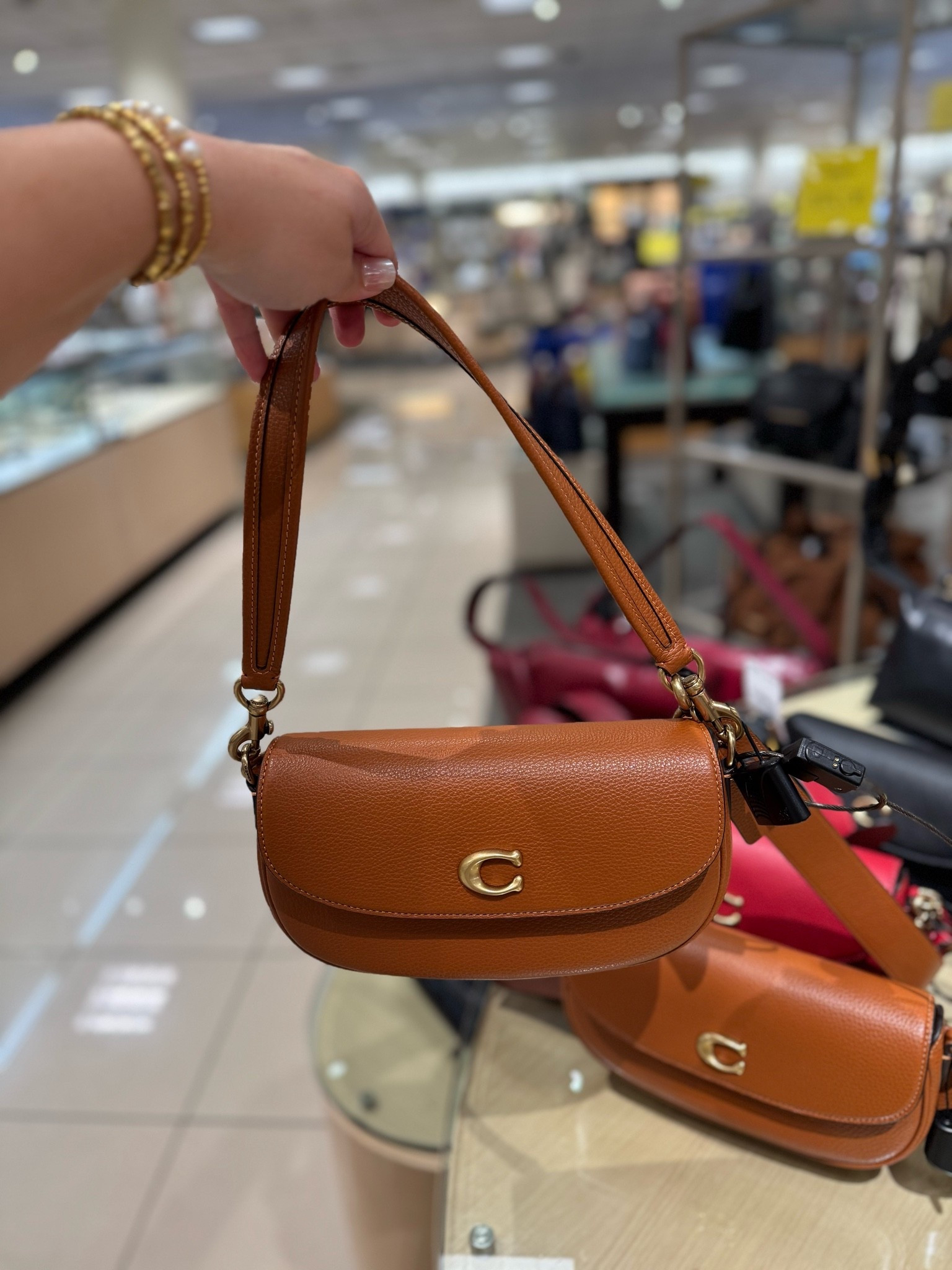Got to see this little cutie Coach bag in person! I love the size and all the color options.

#LTKSaleAlert