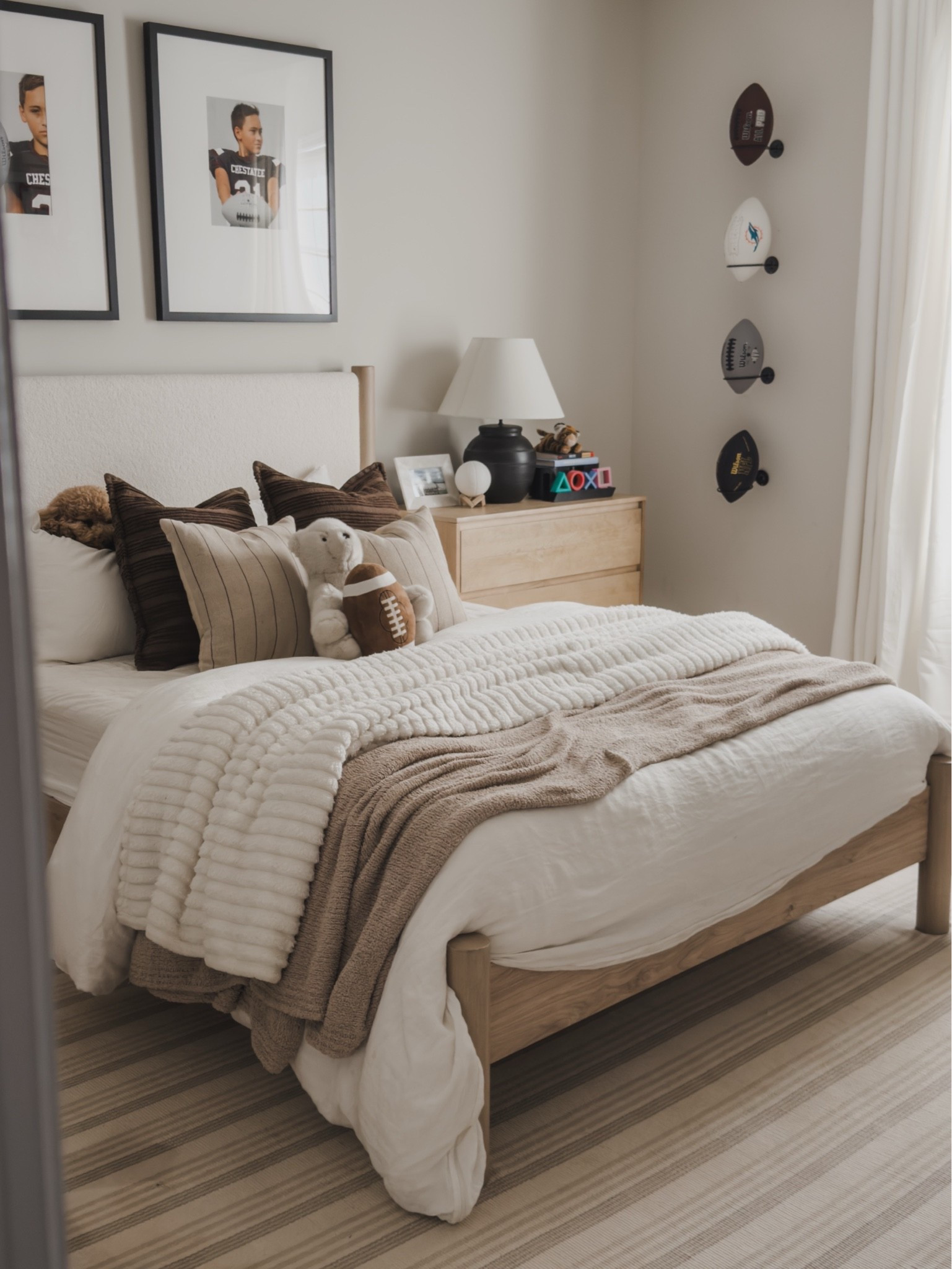 Light and airy boys bedroom inspo featuring a subtle sports theme. Displaying all of my son’s favorite footballs, his trinkets, his sports photos and all the things he loves. 

Using furniture in his room that will grow with him and provide plenty of storage! His nightstands are actually three drawer dressers! 

Boys bedroom inspo, home details, furniture finds, plank and beam, Ashley furniture, target table lamps, football, sports, teen boy, shop the look!

#LTKSaleAlert #LTKHome