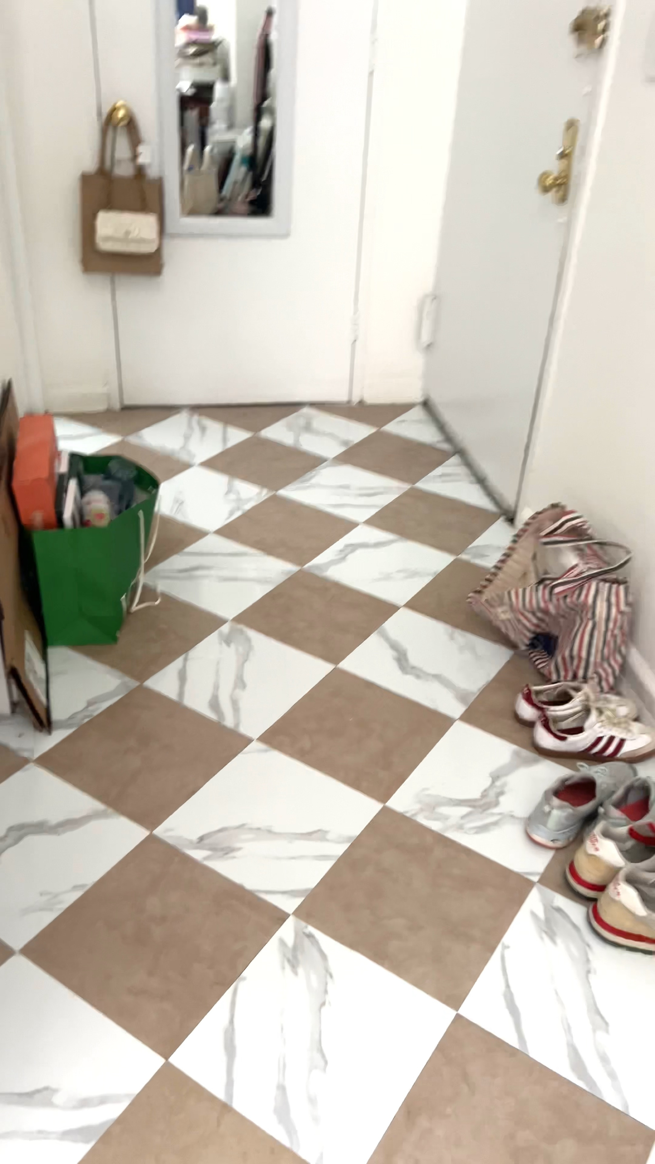 This renter friendly peel and stick diamond flooring has been a GAME CHANGER!!! So easy to apply and makes the whole entry look 100x prettier. I just used a regular xacto knife to cut them on the trickier pieces

#LTKhome #LTKfindsunder50 #LTKfindsunder100