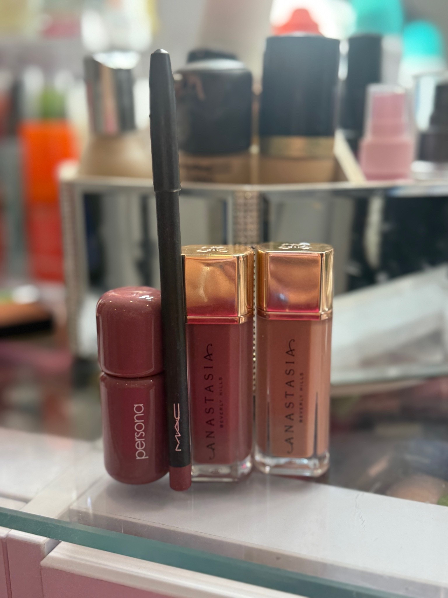 My moms lip combo 
MAC liner in SOAR
Anastasia lip velvet in Rosy Mauve and Softy 
Persona gloss in Mauve