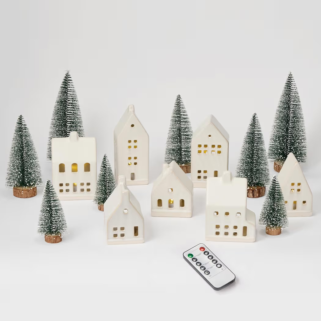 23 Pcs Christmas Village Set - 7 White Ceramic Houses with Remote LED Tea Lights and 8 Snow Trees... | Amazon (US)