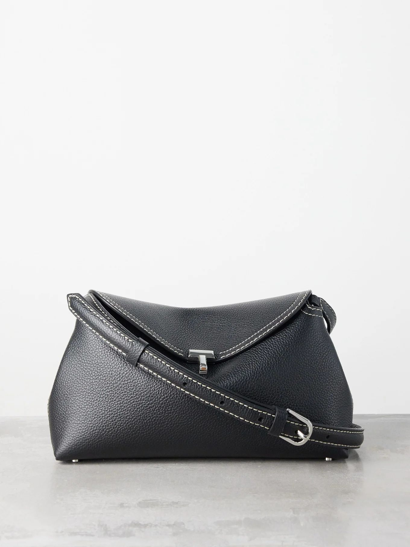 T-lock leather cross-body bag | Toteme | Matches (US)