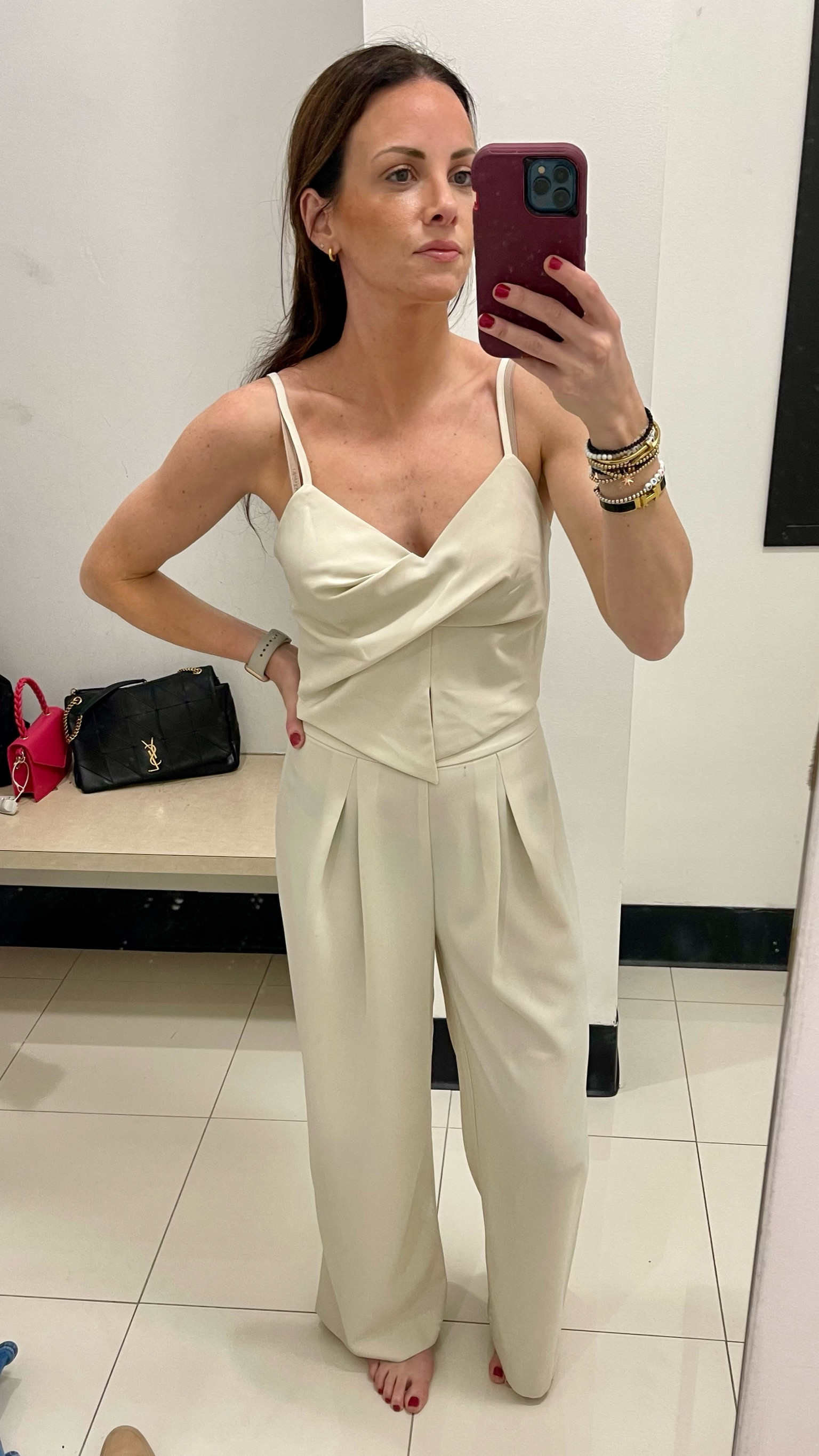 My ultimate aesthetic has officially been unlocked. This cream white set is so comfy, so flattering and can be worn in vacation, totally the office or to date night. The white cami top has a slight asymmetric slit on it and is cropped. The white pants are pleated and wide leg pants.

#LTKSeasonal #LTKworkwear #LTKfindsunder100