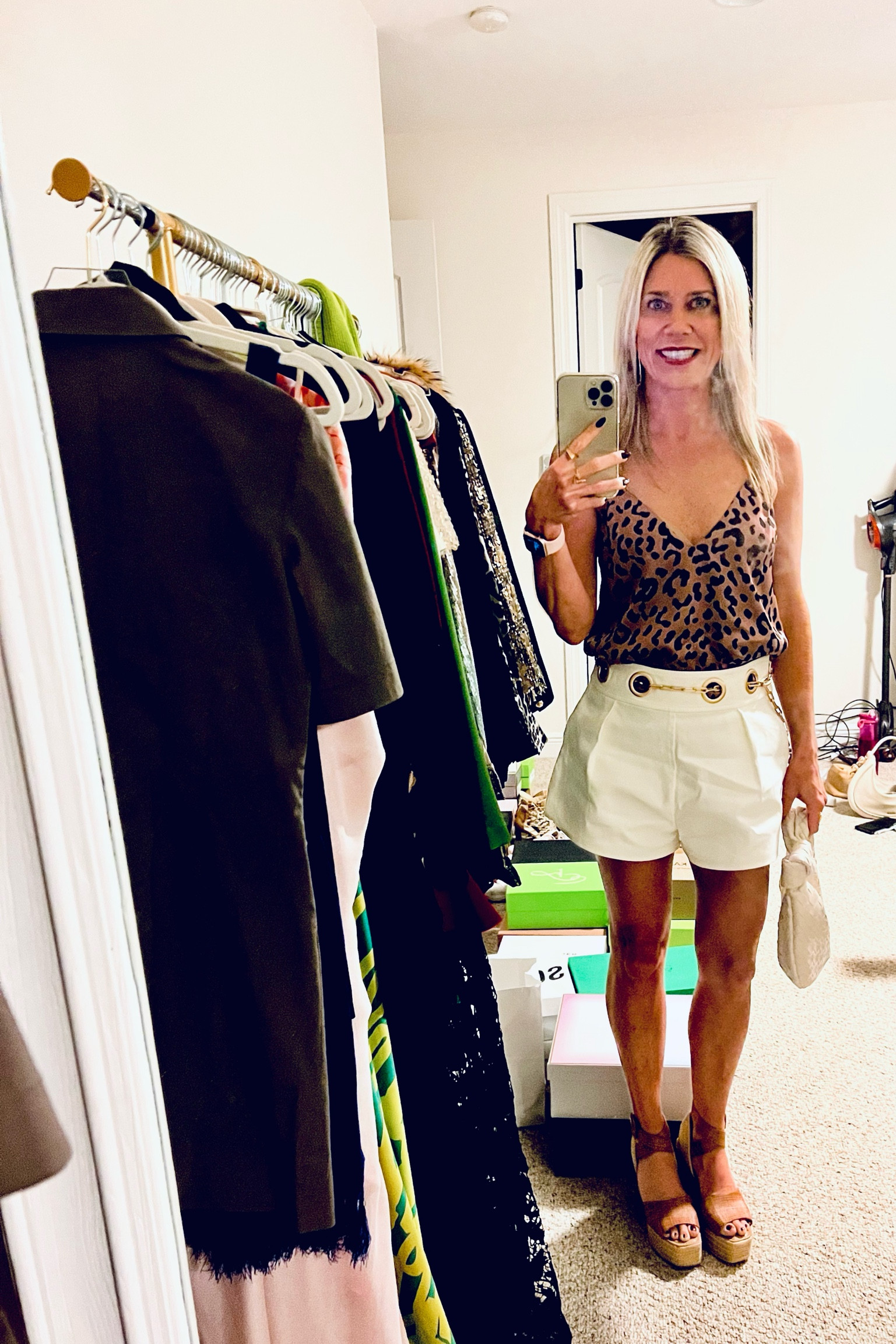 Warm climates fall outfit…animal print silk tank + ivory shorts + wedges.

#LTKSeasonal