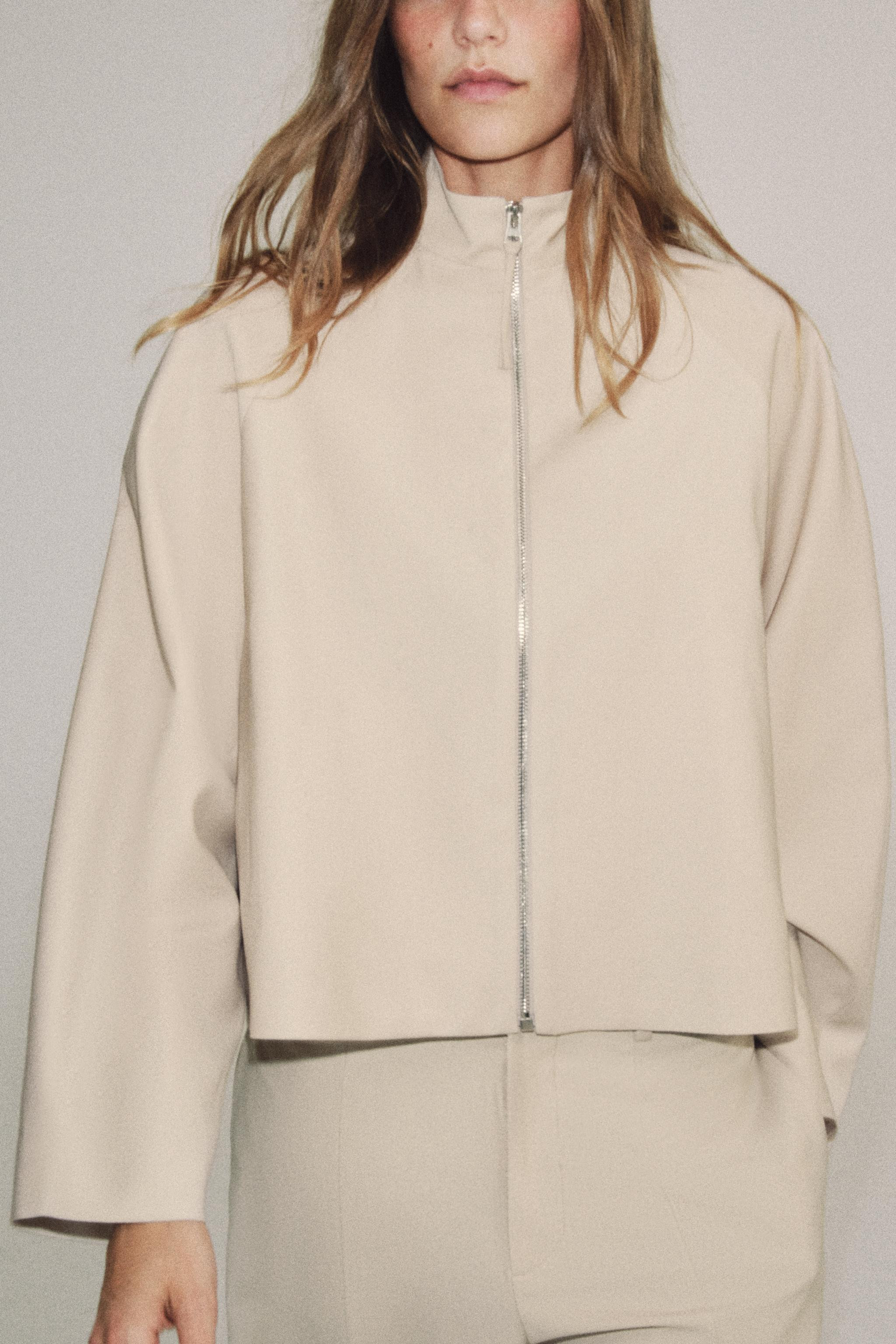 ZARA WOMAN COLLECTIONJacket made from wool blend yarn. High neck and long sleeves. Front pockets.... | Zara US