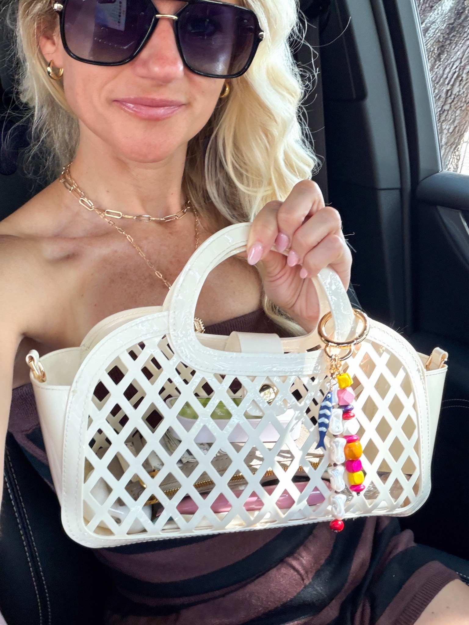 Loving this jelly purse for summer! Comes with a strap for a crossbody style. Add a cute bag charm to elevate the purse! More colors available!

#LTKootd #LTKgrwm #LTKdayinmylife