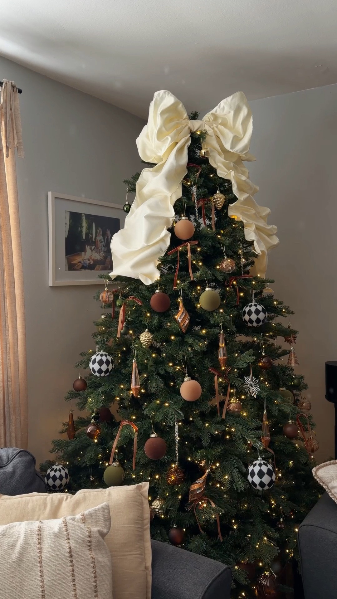 My Christmas tree has not changed a lot since last year, I only added this big beautiful ivory bow to it, linking it and similar ones!

Rustic Christmas tree • Christmas decor • holiday tree • Christmas tree topper • ornaments 

#LTKHome #LTKSeasonal #LTKHoliday