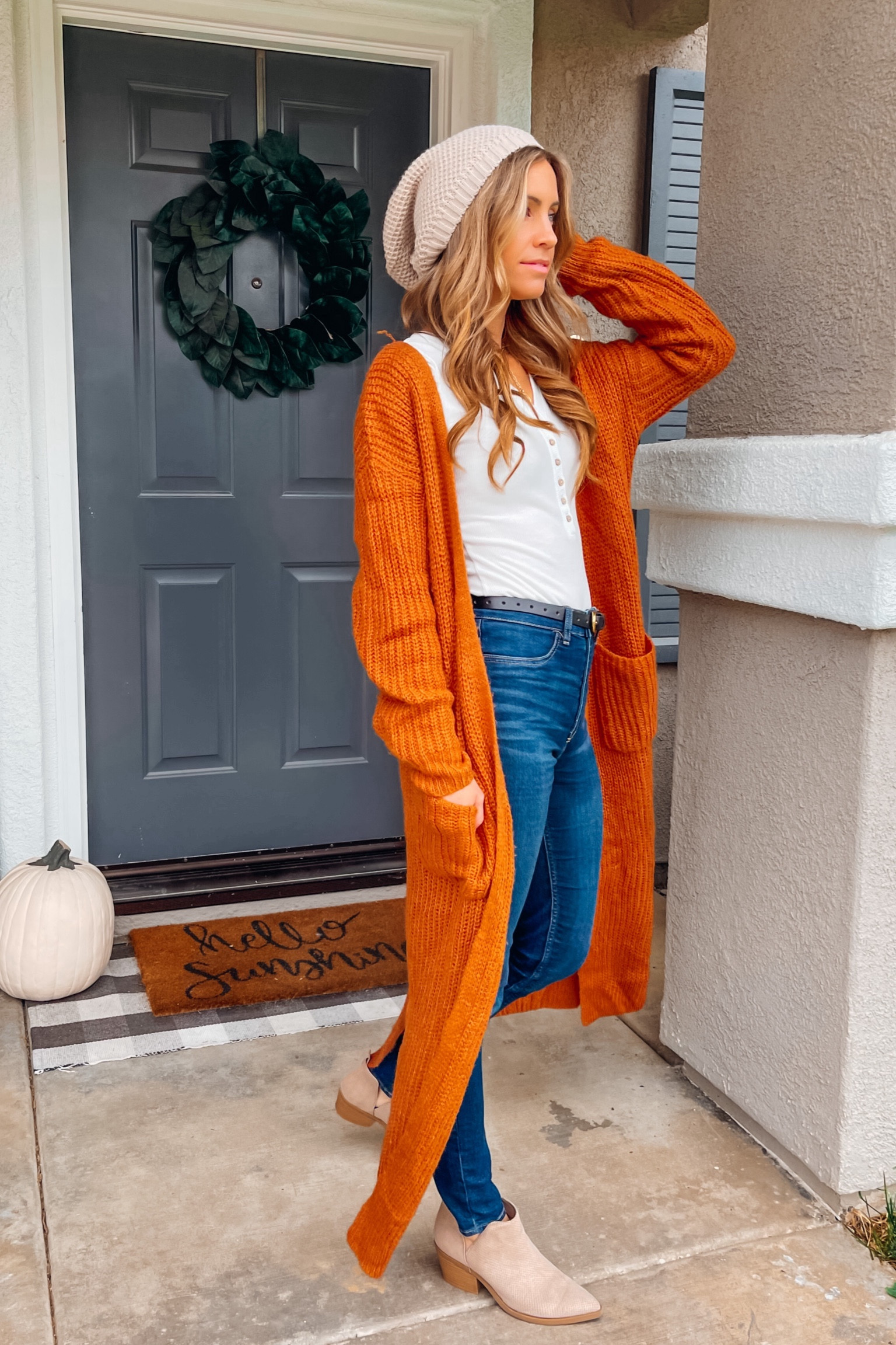 Fall layers in full effect: from the long sleeve white shirt to the cozy rust cardigan, paired with blue high-waisted skinny jeans and suede booties. The slouchie beanie adds that extra touch of fall vibes. Ready to embrace the season in style.

Fall outfit. Thanksgiving outfit. Casual thanksgiving outfit. Long cardigan. Jeans. High waisted jeans. Boots. Ankle boots.
#jenniferxerin #stylewithjen #falloutfit #thanksgivingoutfit #AutumnChic #fallOOTD #ltkpetite #ltkunder200

#LTKfindsunder100 #LTKSeasonal #LTKsalealert