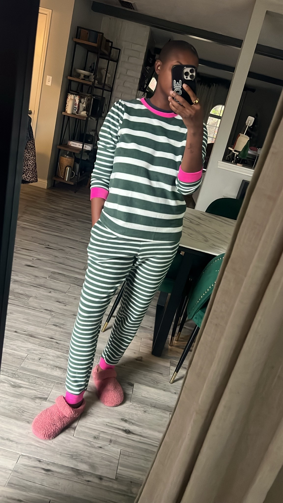 The softest festive set of pajamas for a warm cozy feel! Green and white striped top and bottom with pink pop of color! 

#LTKHoliday #LTKGiftGuide