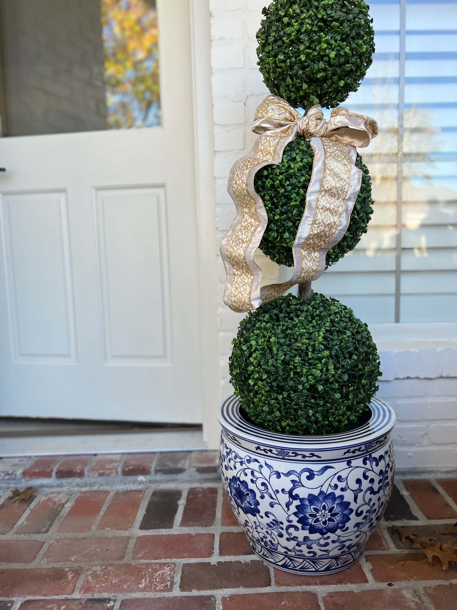 Blue and white planter, faux boxwood topiary, Christmas front door decor, front porch decor, chinoiserie, blue and white, grandmillennial, williams-Sonoma, amazon home, Amazon home finds 

#LTKstyletip #LTKhome #LTKsalealert