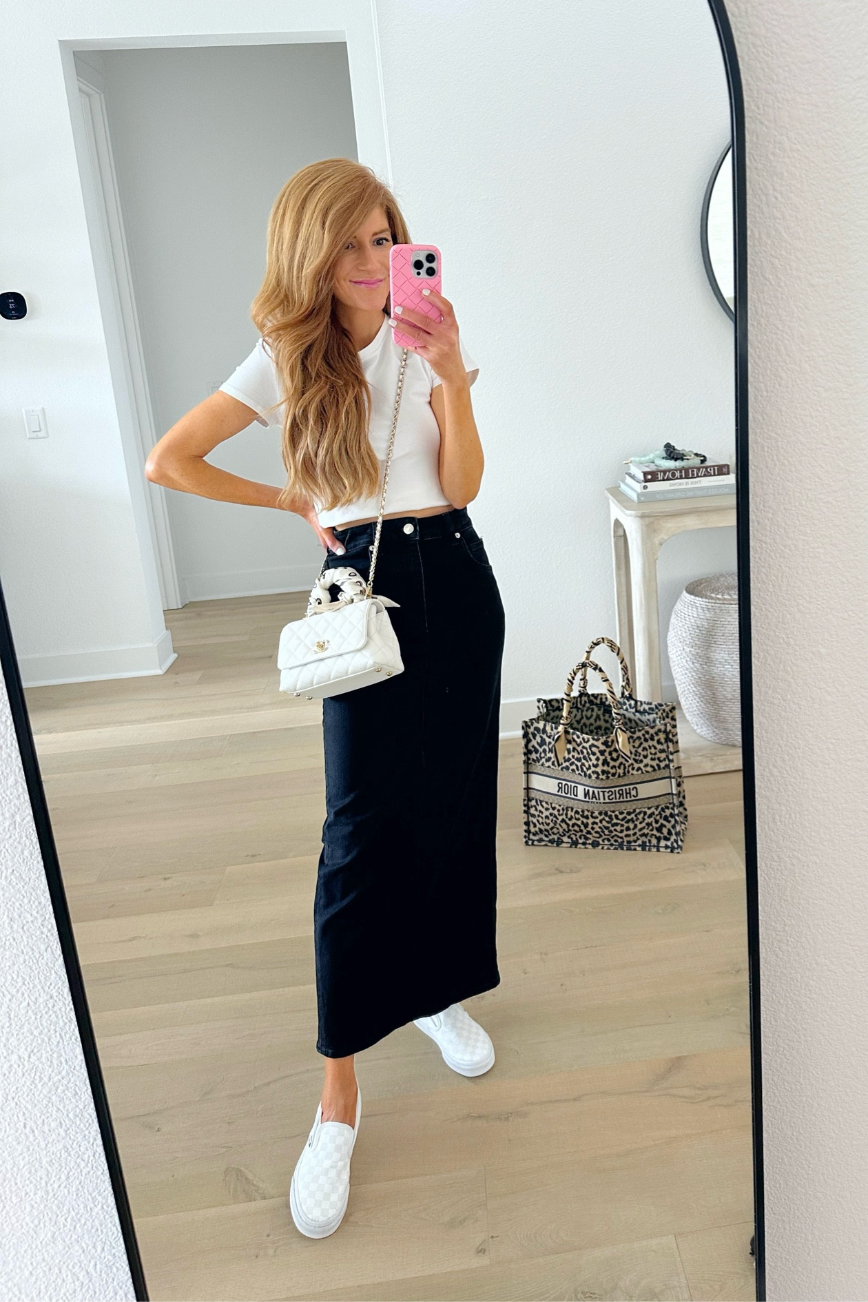 Travel outfit love this black jean skirt midi white tee vans sneakers on sale!

#LTKsalealert #LTKshoecrush #LTKunder100