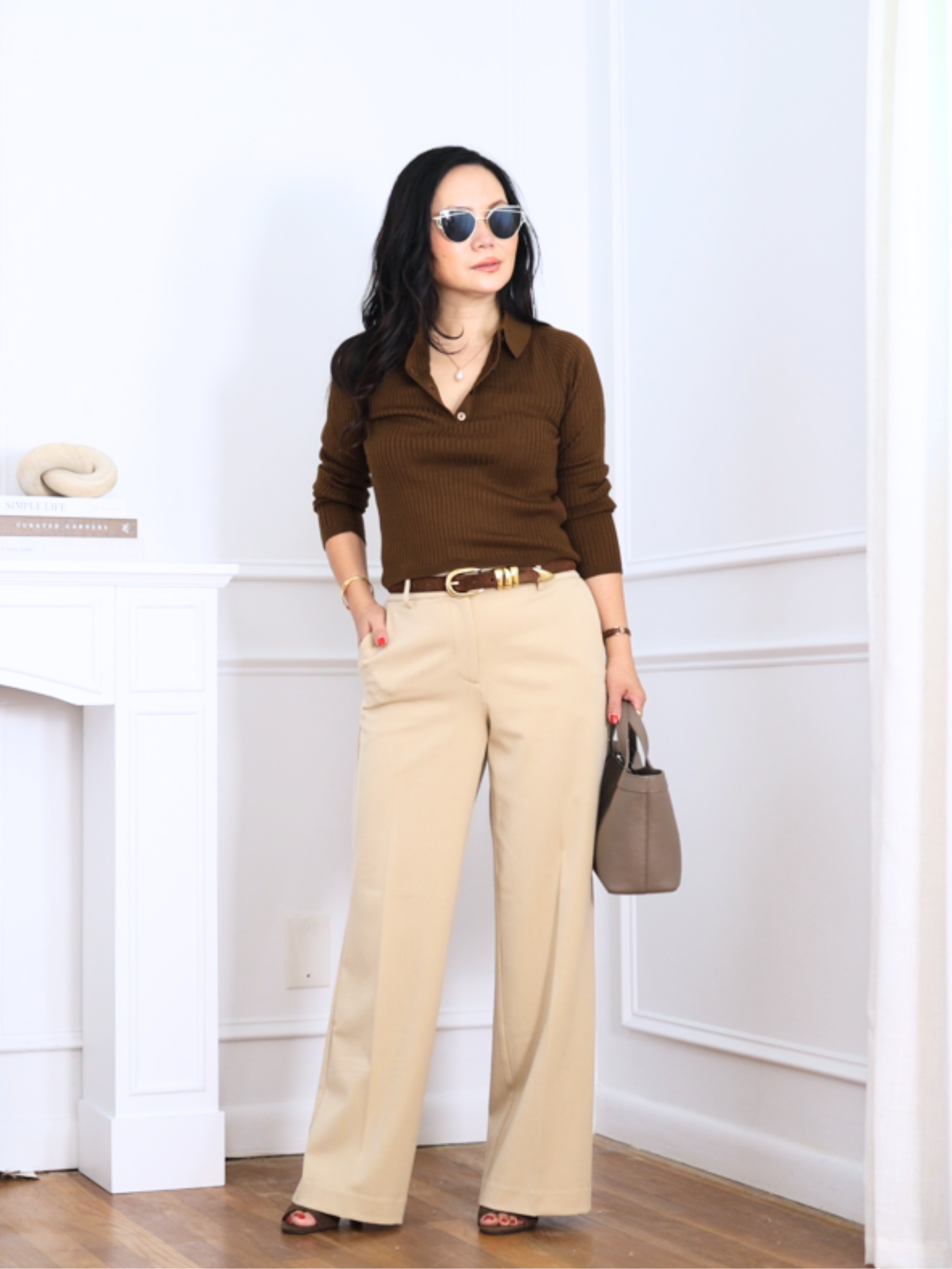 I love this UNIQLO top, especially because of the V neckline. Showing a little more of your neckline is one of my favorite tricks for looking longer and leaner. I’m wearing size XS. Wearing with Ann Taylor wide leg pants. 

 #LTKSeasonal #LTKOver40 #LTKPetite