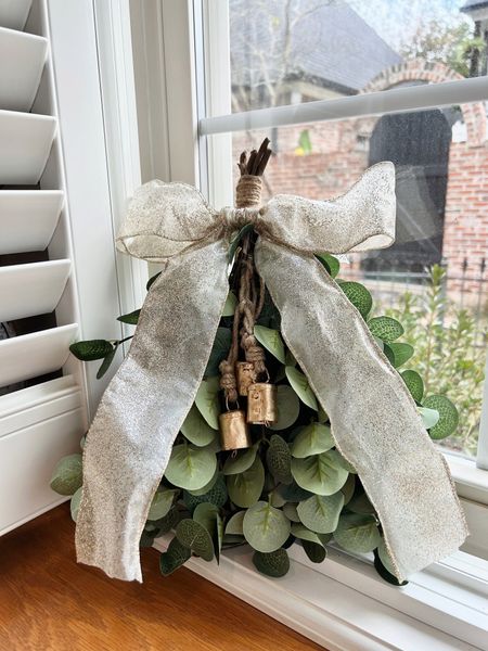 Materials for a DIY window swag. 

Eucalyptus leaves, stems, florals, eucalyptus stems, Christmas bells, mini bells, rustic bells, bells on rope, window decor, wall decor, wreath, Christmas decor, holiday decor