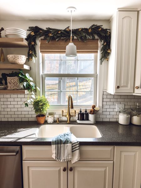 Christmas Kitchen✨🌲✨
Star garland above the window 
Kitchen decor 
Brass faucet


#LTKSeasonal #LTKHoliday #LTKhome