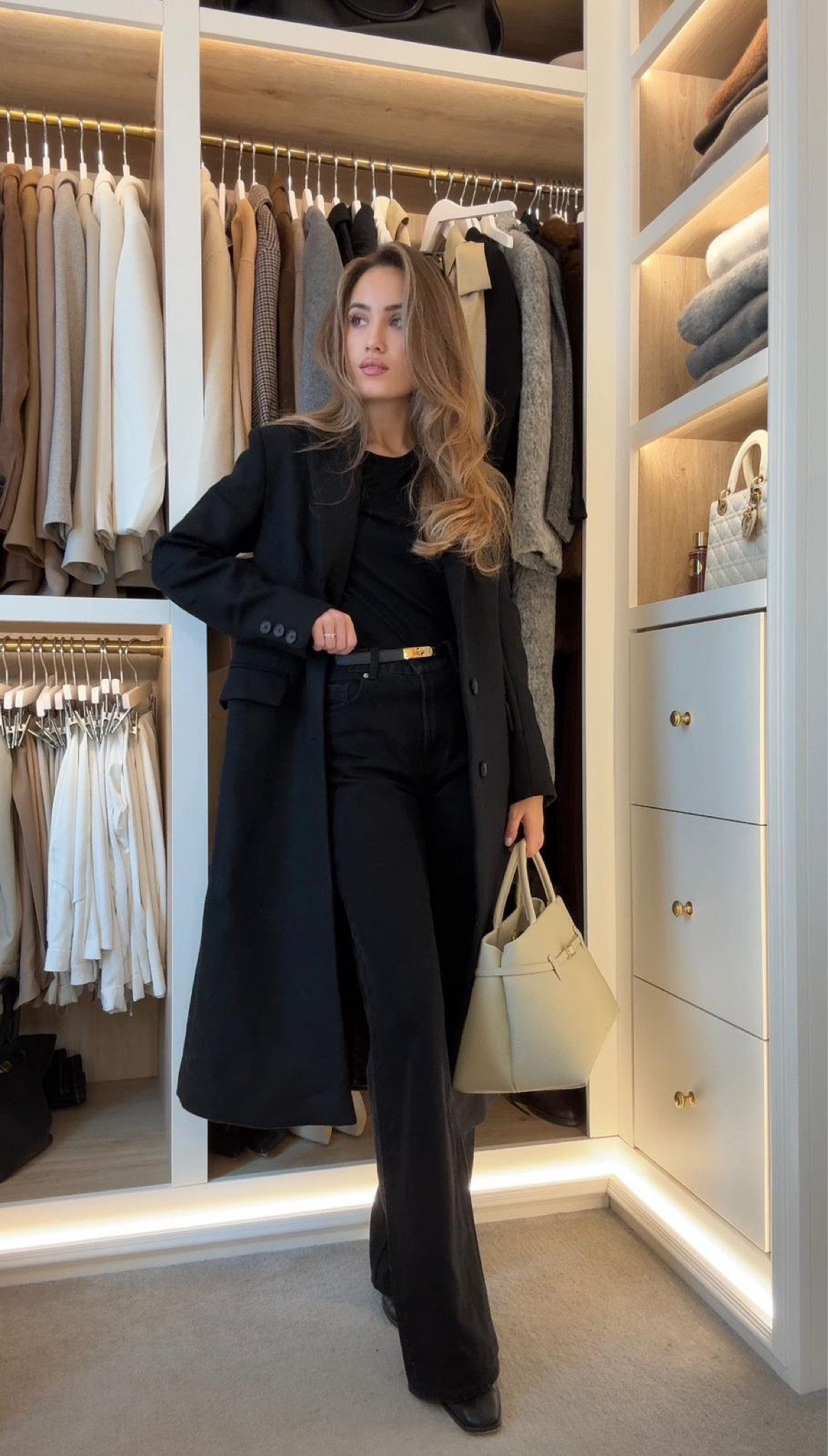 Little outfit of the day styling my new Manu Atelier bag 🤍 easy smart casual monochrome autumn look for the weekend, Karen Millen Coat, Theory top and H&M jeans

#LTKautumn #LTKworkwear #LTKstyletip