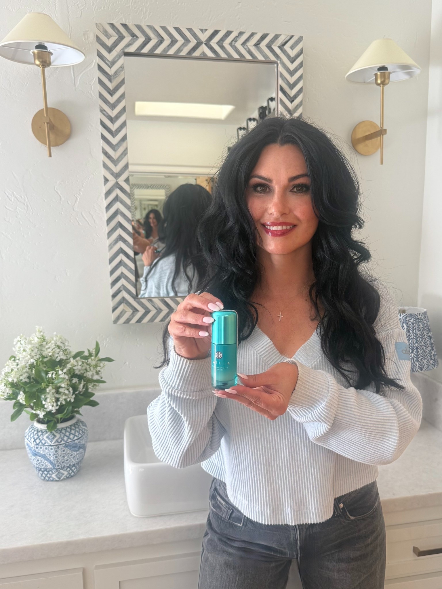 I love this Tatcha skincare anti-aging serum! 
It smells so good too. 🩵

I linked my bathroom decor items, such as my Serena and Lilly sconces, from my remodel, as well as my makeup. 

I love my Tarte plumbing lip liner, Wonderskin lip stain and my fav L’Oreal Telescopic mascara!

My cute blue top goes so well with my dark wash denim jeans. 

#bluesweater #blackdenim #bluetop #blackshoes #widelegjeans

#LTKBeauty #LTKHome #LTKSaleAlert