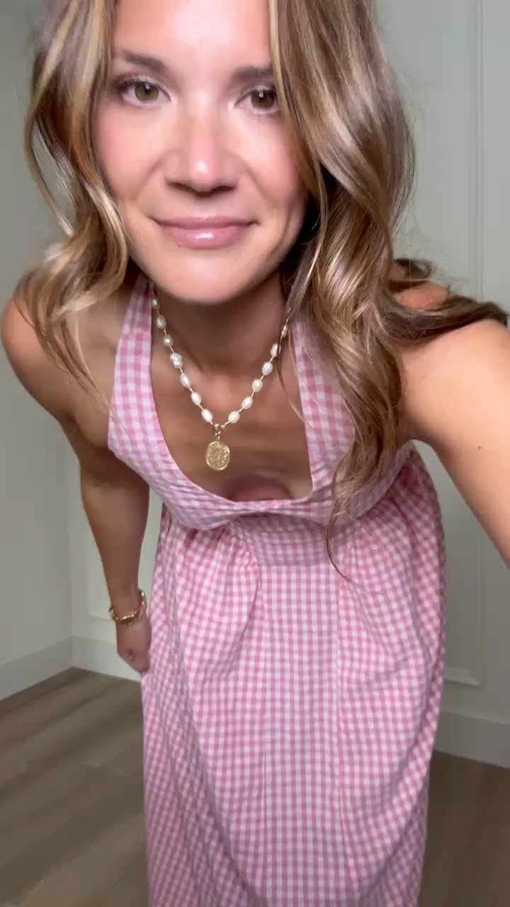 This pink gingham midi dress looks so much more expensive than it is. The flattering halter neckline, fitted bodice, and flowy skirt make it perfect for summer parties, vacation dinners, bridal events, or Fourth of July celebrations.

Pink gingham dress, Midi dress, Summer dress, Vacation outfit, Bridal shower dress, Baby shower outfit, Fourth of July outfit, Feminine fashion, Cottagecore style, Summer wedding guest dress, Amazon fashion find, Pink summer style, Tall girl friendly, StangandCo

#LTKSeasonal #LTKTall #LTKTravel