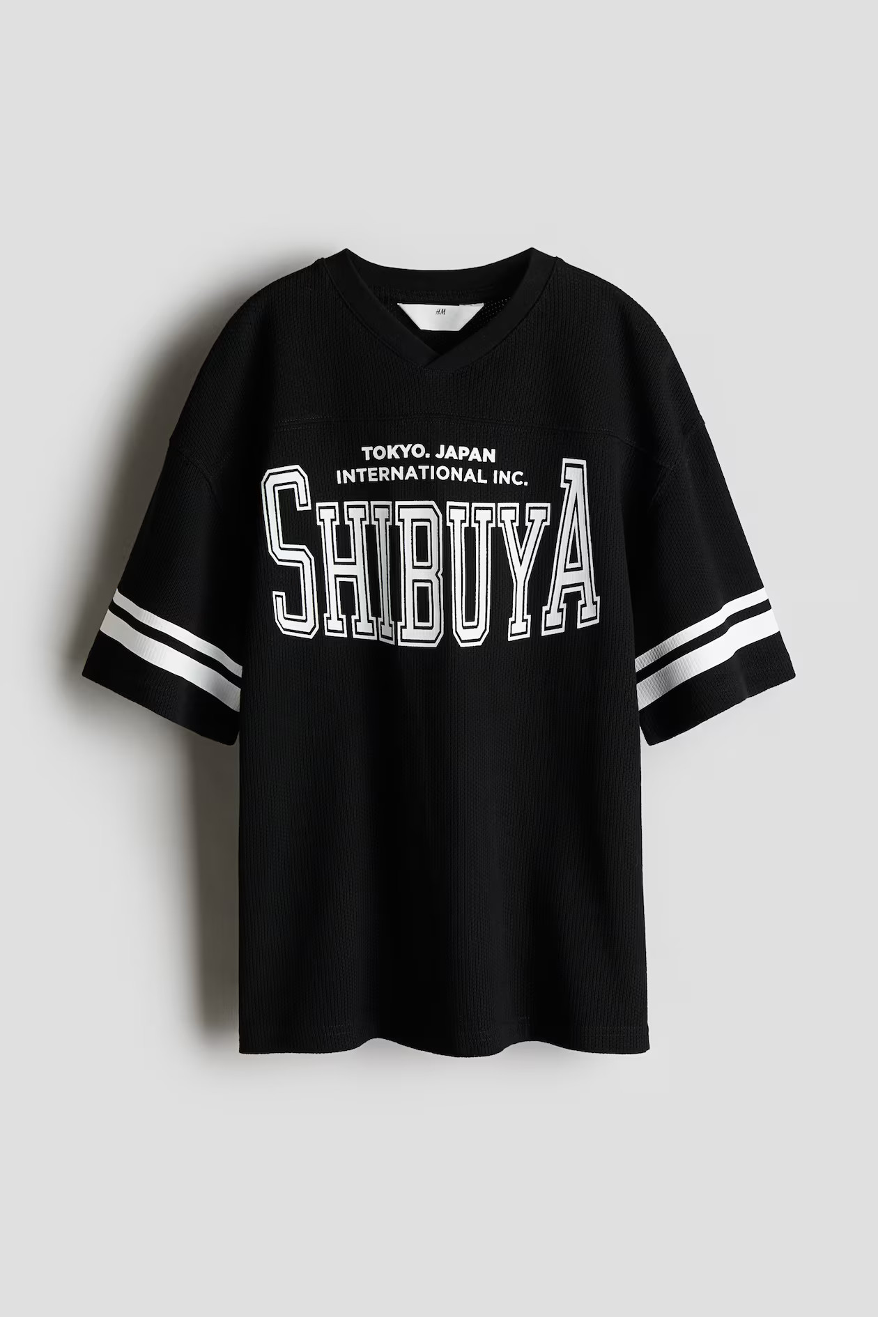 - Loose-Fit Hockey Shirt - Black/Shibuya - Kids | H&M US | H&M (US + CA)