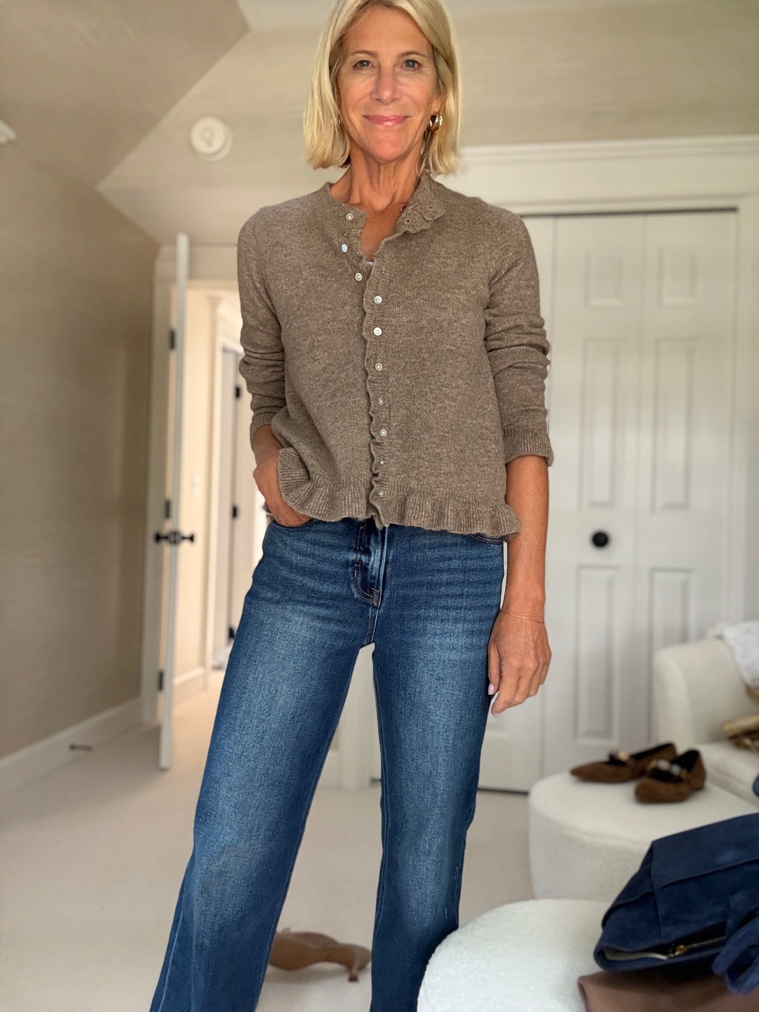 Greatest little ruffle cardigan! Perfect with jeans

#LTKootd #LTKOver40 #LTKTravel