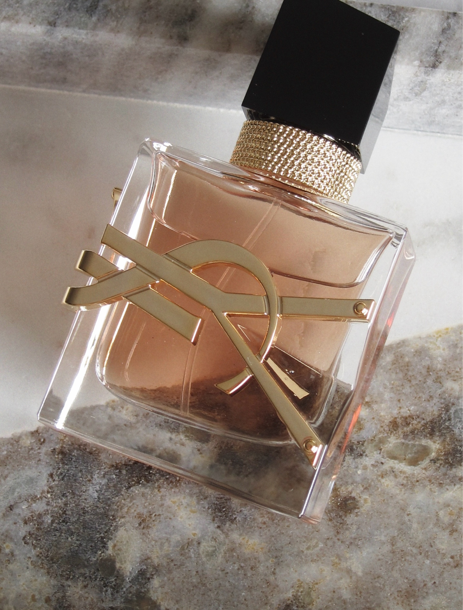 YSL BESUTY 

Keywords
Warm Floral Perfume, Creamy, Warm Vanilla Fragrance, Tropical Scent, Sun-Kissed Fragrance, Women's Lily Perfume, Sensual Scent, Long-lasting, Golden

Type
Long-Lasting Women's Fragrance

What it is
Libre Flowers & Flames is a new sultry floral blast, a warm sensual and sun-kissed interpretation of Libre. At the heart of the floral fragrance blooms a sun-kissed and creamy coco-palm tree flower melted with a spicy and solar lily flower. Beneath this blazing bold floral, a base of rich vanilla for sensuous warmth and unforgettable long-lastingness. An endless bloom of freedom. Flowers have never been so hot.

About the fragrance
Sun-kissed coco-palm tree flower accord: captured in the blazing afternoon in YSL Beauty’s Ourika community gardens, the coco-palm flower accord gives a creamy tropical coconut sensation. Solar & warm, it adds comfort and softness to the floral fragrance. Radiant lily accord from the desert: in a tribute to the house’s heritage and to Yves Saint Laurent’s favorite flower, the master perfumers reimagined the captivating scent of the luminescent desert lily flower. A lush and carnal accord, bringing a warm & powerful femininity to Libre’s floral scent. Iconic orange blossom from Morocco: a signature ingredient of Libre, opulent, bright & sensuous, bringing a searingly feminine expression to a bold & confident woman. Vibrant diva lavender from France: a daringly bold flower expression giving a vibrant freshness to the iconic floral signature of Libre.

Libre Flowers & Flames introduces a new it-couture bottle shade & sets fire to the classic codes of florality. Lit up by a new golden sand color, this new gem reflects the radiance and warmth of its olfactory notes. A sexy elegant hue to keep in your wardrobe.

#LTKOver40 #LTKBeauty #LTKSeasonal