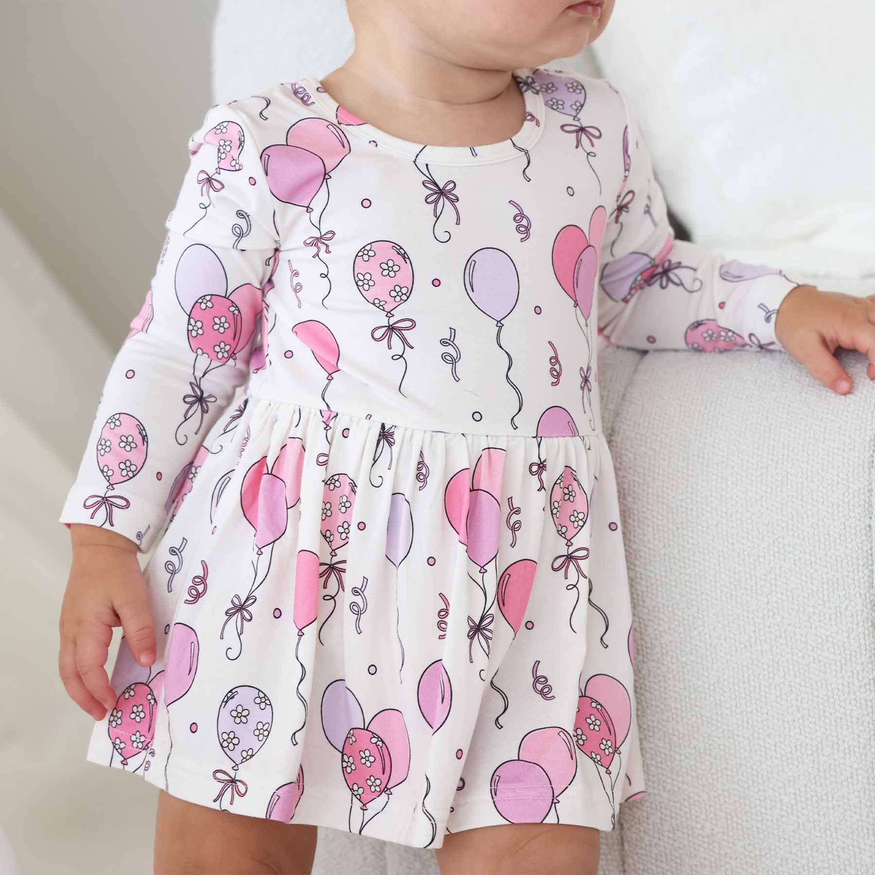 Long Sleeve Twirl Bodysuit | Party Time Pink | Caden Lane