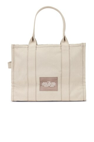 Marc Jacobs The Large Tote Bag in Beige from Revolve.com | Revolve Clothing (Global)