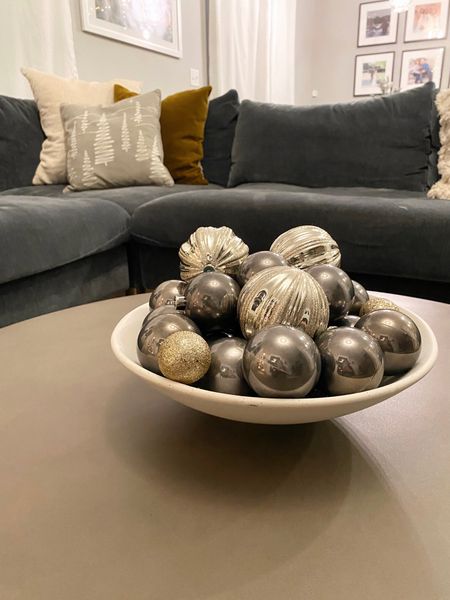 Festive coffee table centerpiece and throw pillows for Christmas! 

#LTKhome #LTKSeasonal
