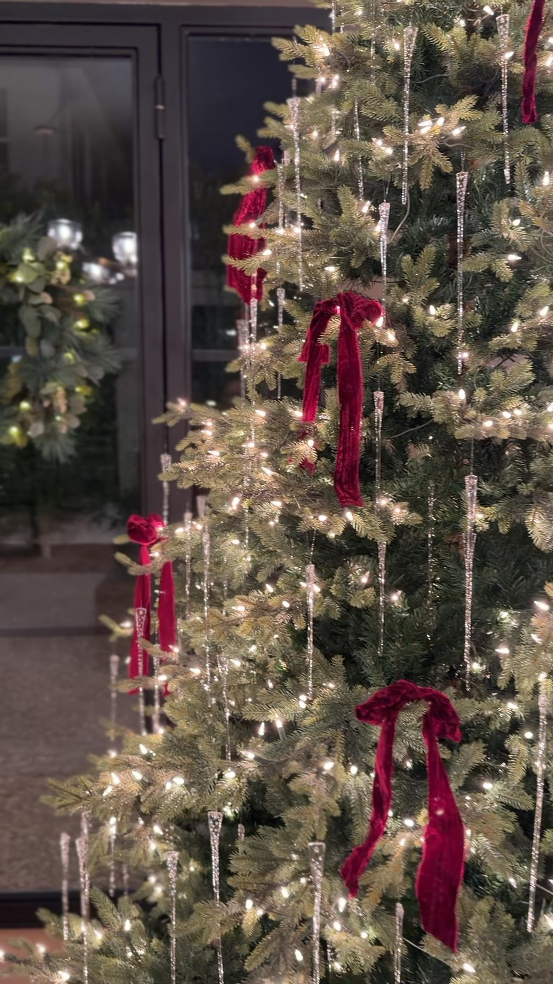 Simple tree with a pop of color 🤍

christmas tree, burgundy ribbon, burgundy christmas decor, icicle ornaments, glass icicle ornament, lit up wreath, evening holiday glow, warm christmas lighting, cozy holiday home, christmas decorations, festive entryway, glowing christmas scene, elegant holiday styling, moody christmas decor, classic christmas colors, burgundy holiday ribbon, winter decorating ideas, christmas ornament ideas, holiday wreath inspiration, cozy nighttime christmas, seasonal home styling, holiday home tour, christmas decorating inspo, ribbon wrapped tree, glowing wreath decor

#LTKHome #LTKSeasonal #LTKHoliday