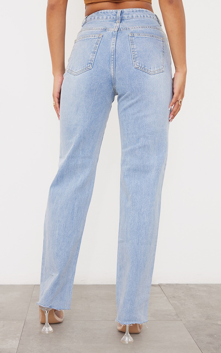 PRETTYLITTLETHING Light Blue Wash Ripped Long Leg Straight Jeans | PrettyLittleThing US