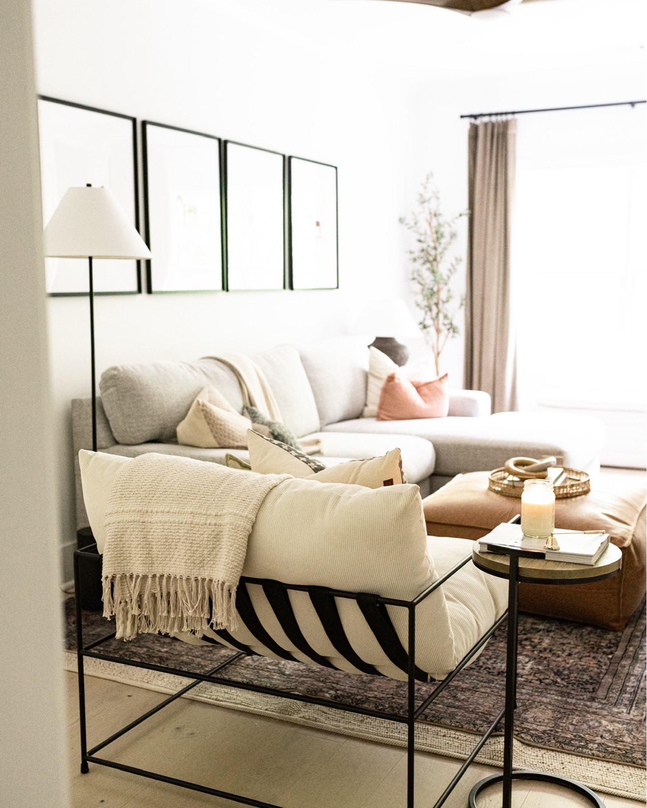 🛋️ This is what living room dreams are made of. A soft sectional layered with neutral pillows, a leather ottoman that doubles as a coffee table, warm lamp lighting, and the glow of a candle—it’s the perfect Modern Classic mix of comfort + timeless design. ✨

Do you want to bring our dreamy Modern Classic style interior design into your own home? 🏡 You’re in luck! Reserve our Online Interior Design packages today -> https://porcheandco.com/edesign ✨ We can’t wait to work with you & design your home with #porcheandco

#porcheandco #modernclassic #livingroomdecor #neutralstyle #modernclassicdesign #livingroominspo #homedesigninspiration #modernfarmhousevibes #cozyhomestyle #interiordesign

#LTKdayinmylife #LTKHome #LTKvlog