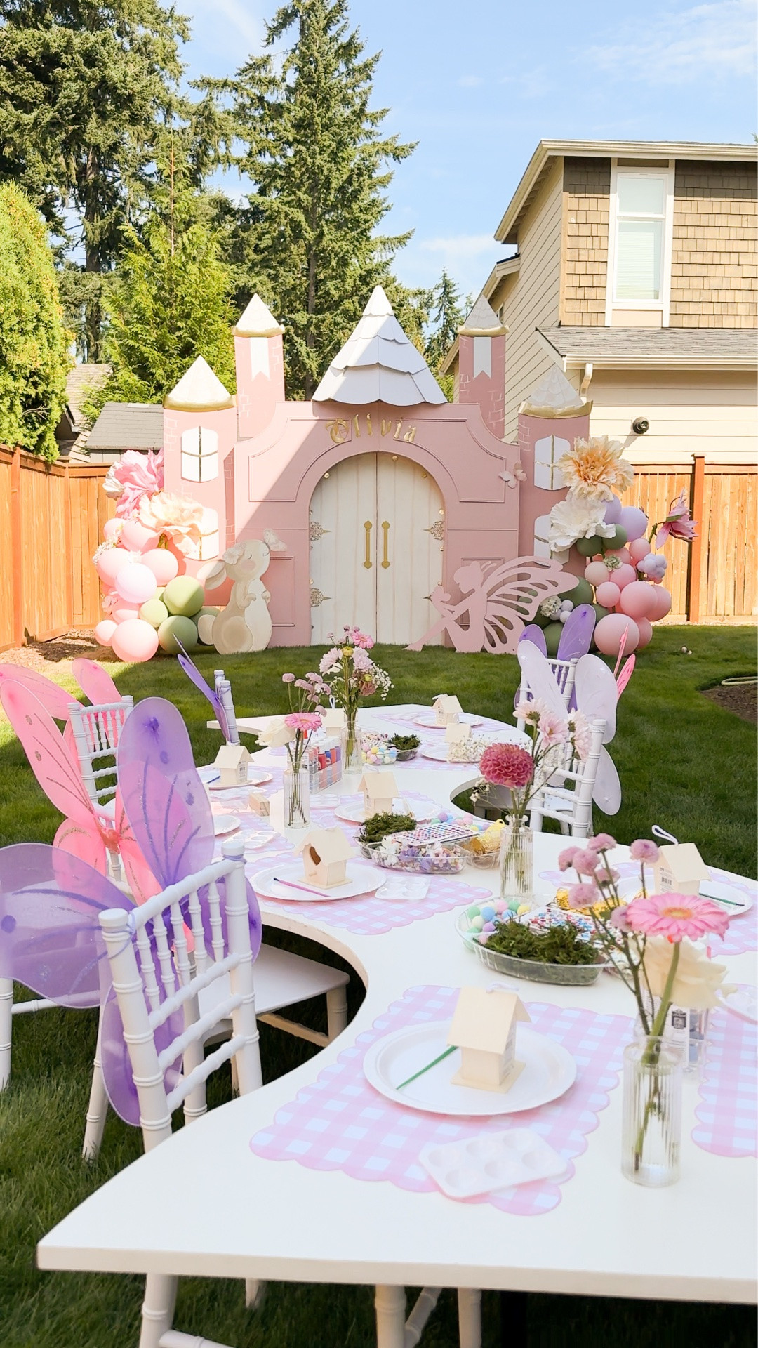Fairy house painting, crafting table for kids! Instead of a kids’ eating table, I started doing craft tables instead! 🧚🎨✨ 

I used to set up tables with enough chairs for every child, thinking they’d all sit together to eat. But at every party, the kids would just grab a quick bite and go right back to playing. The plates, cups, and utensils barely got used.

Now I use that budget towards a craft activity instead. It keeps the kids entertained and doubles as a party favor! Which would you choose - kids’ eating table or craft table? #fairybirthday #craftparty #kidsbirthdayparty

Fairy wings with wands, craft paint, butterfly decoration, wooden heart birdhouse, pink gingham, gems stickers, mini faux flower for craft, plastic serving tray, colorful pom poms, birthday decoration, bud vases, acrylic sign, green mass, kids chairs, glue