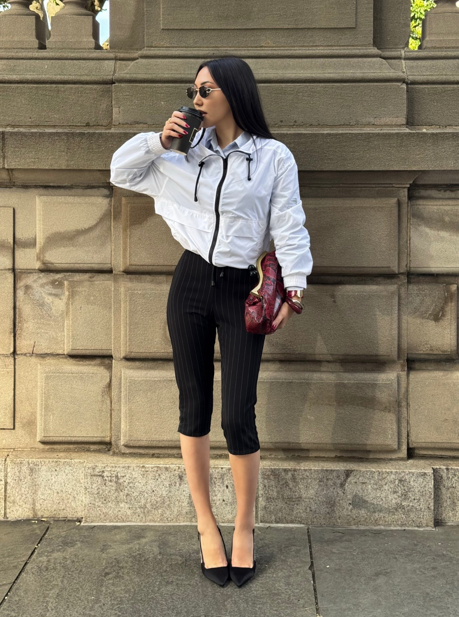 Windbreaker  link : https://usopenshop.org/products/us-open-womens-performance-full-zip-windbreaker-white

Capris : Bershka
Heels : balmain 
Bag : vintage. From Russia 
