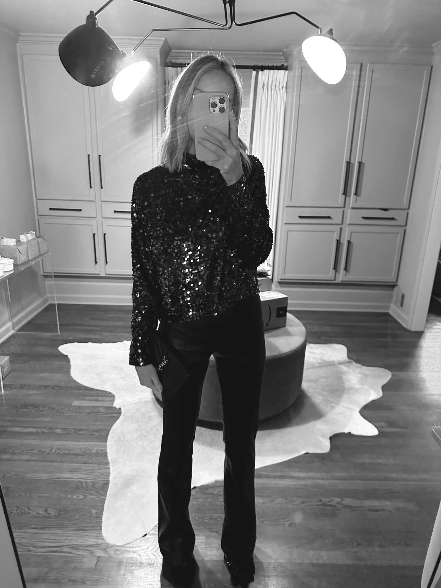 Last nights ootd ✨ love the swing shape and cozy cashmere interior of this sweater! It’s seriously so so comfy and the baby black sequins are perfect. Size xs! The leather pants are restocked a little and such a good fit… size 2! 