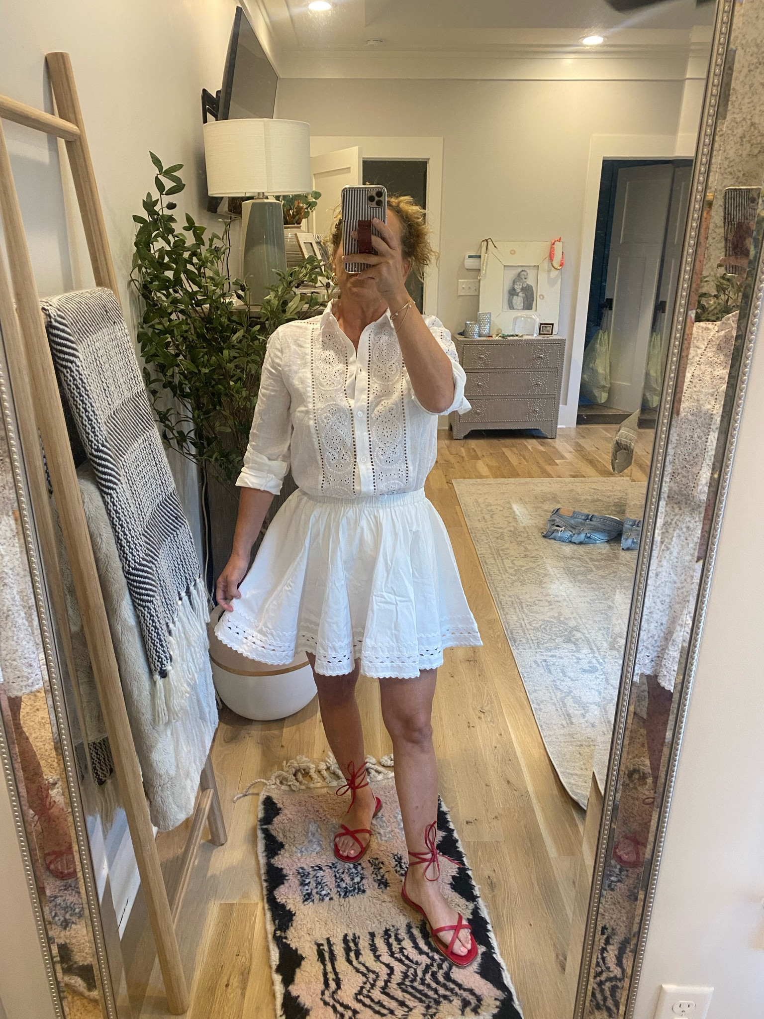 All white summer look!  Love this skirt and top paired with red shoes for a pop of color!  This skirt is fully lined so it makes wearing white easy and not see through!  Yay!

Style for over 40

Summer style, summer outfit, summer white outfit, white skirt, white eyelet skirt, white button down, white eyelet shirt, white linen shirt, red shoes, red sandals
