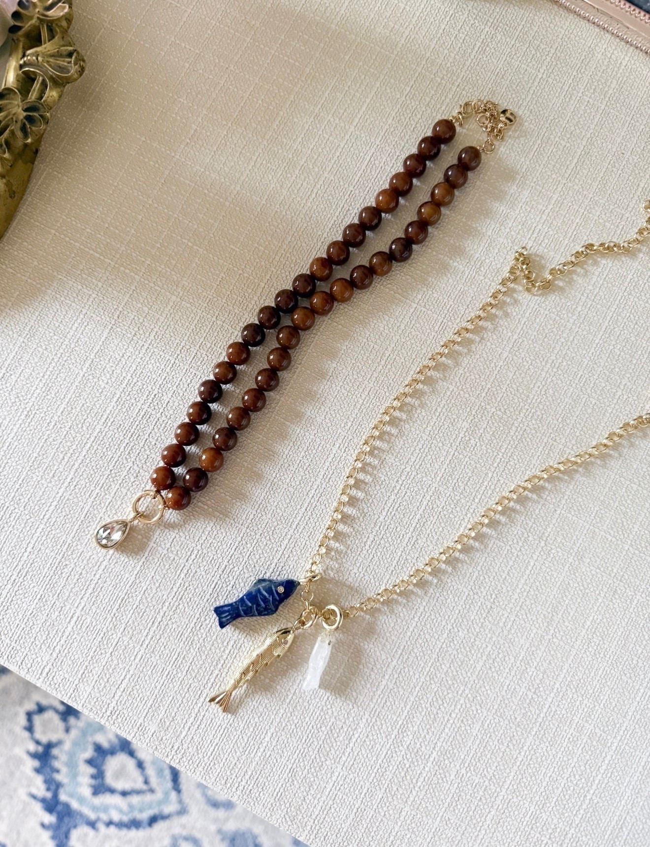 Jewelry that feels collected over time. I love the mix of warm beads, gold details, and unexpected charms for adding a little personality to any look.

beaded necklace, charm necklace, gold jewelry, layered necklaces, statement jewelry, fish charm necklace, beaded jewelry, jewelry finds, unique jewelry, girlonthehudson

#LTKSeasonal #LTKOver40 #LTKootd