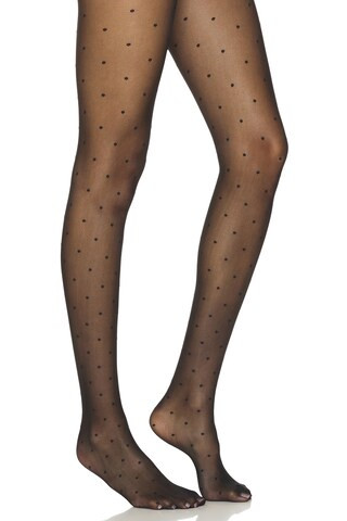 FALKE Dot Tight in Black from Revolve.com | Revolve Clothing (Global)