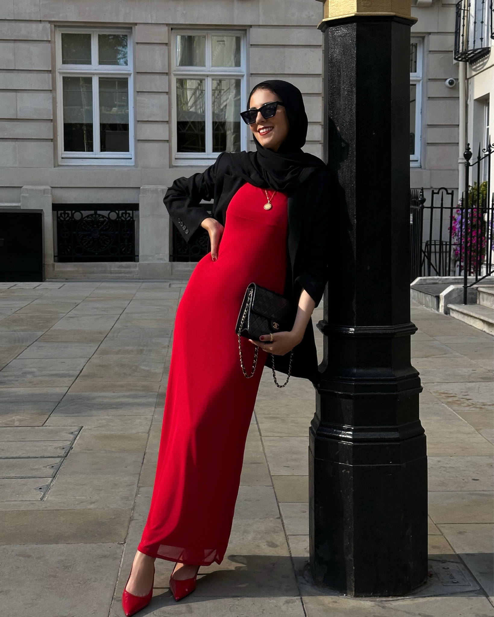 black dress with red hijab Black suit with red scarf