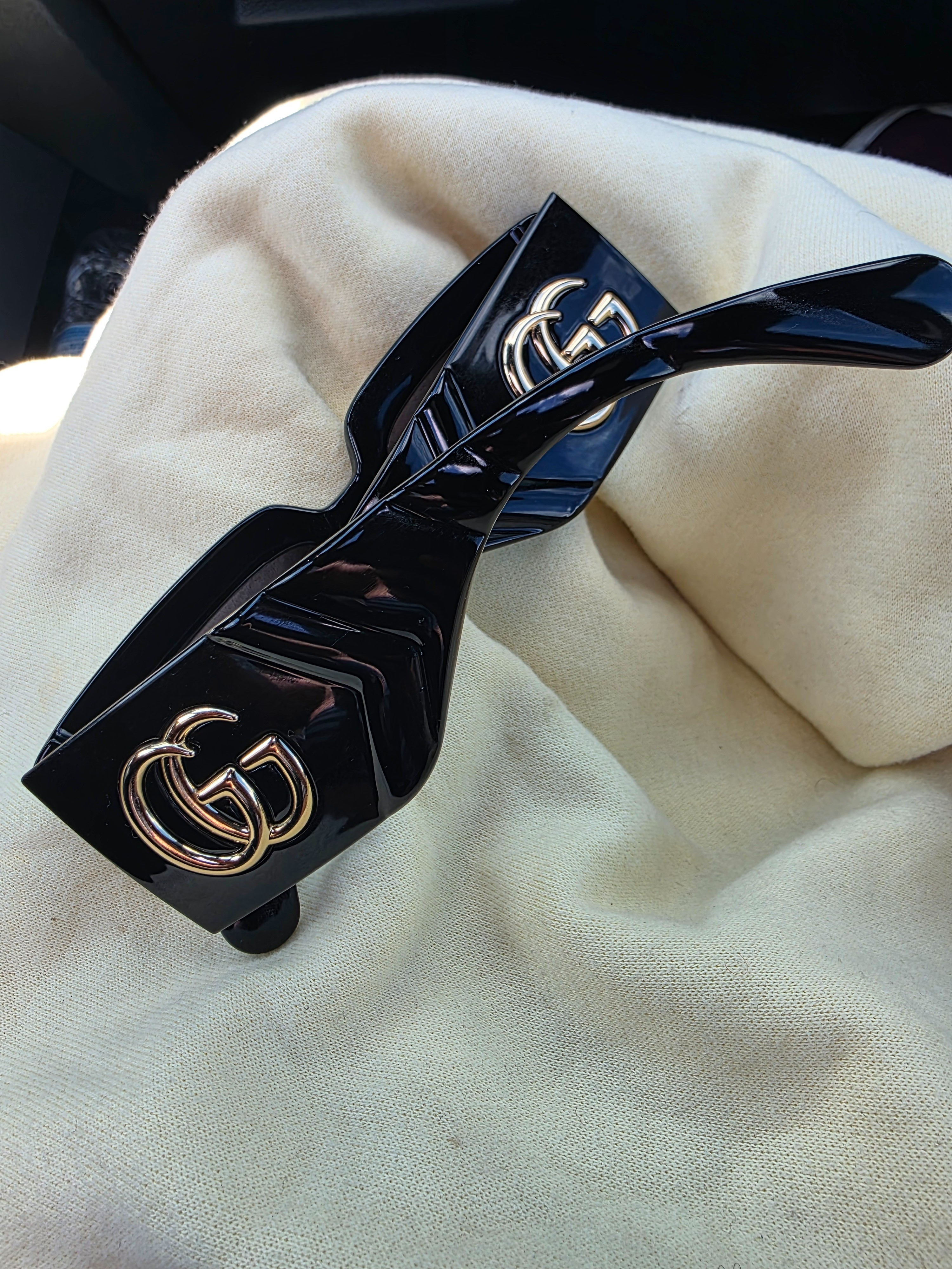 Black Gucci sunglasses

