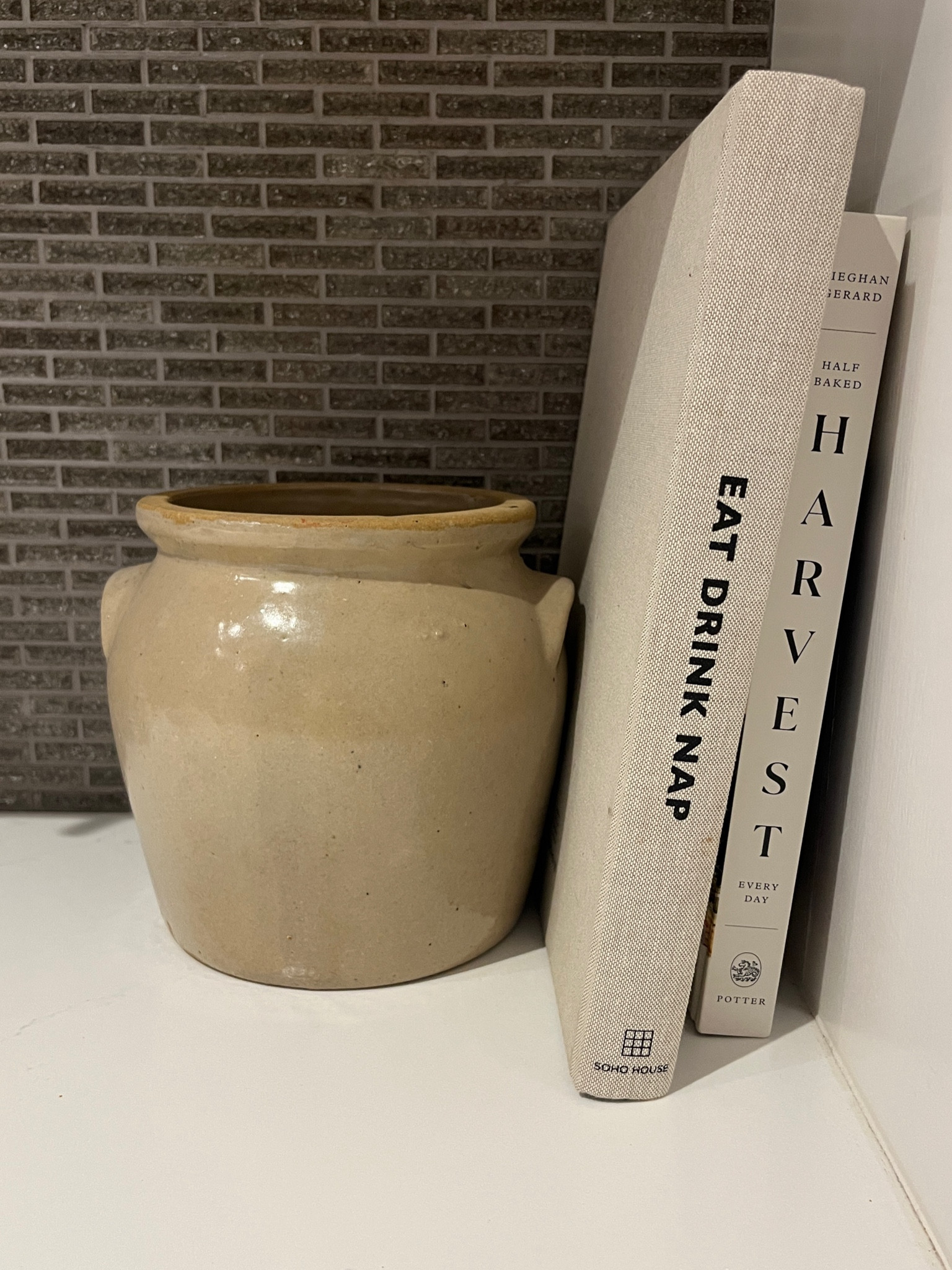Kitchen counter decor - vintage French confit pot stoneware crock and neutral coffee table books 

#LTKfindsunder50 #LTKstyletip #LTKhome