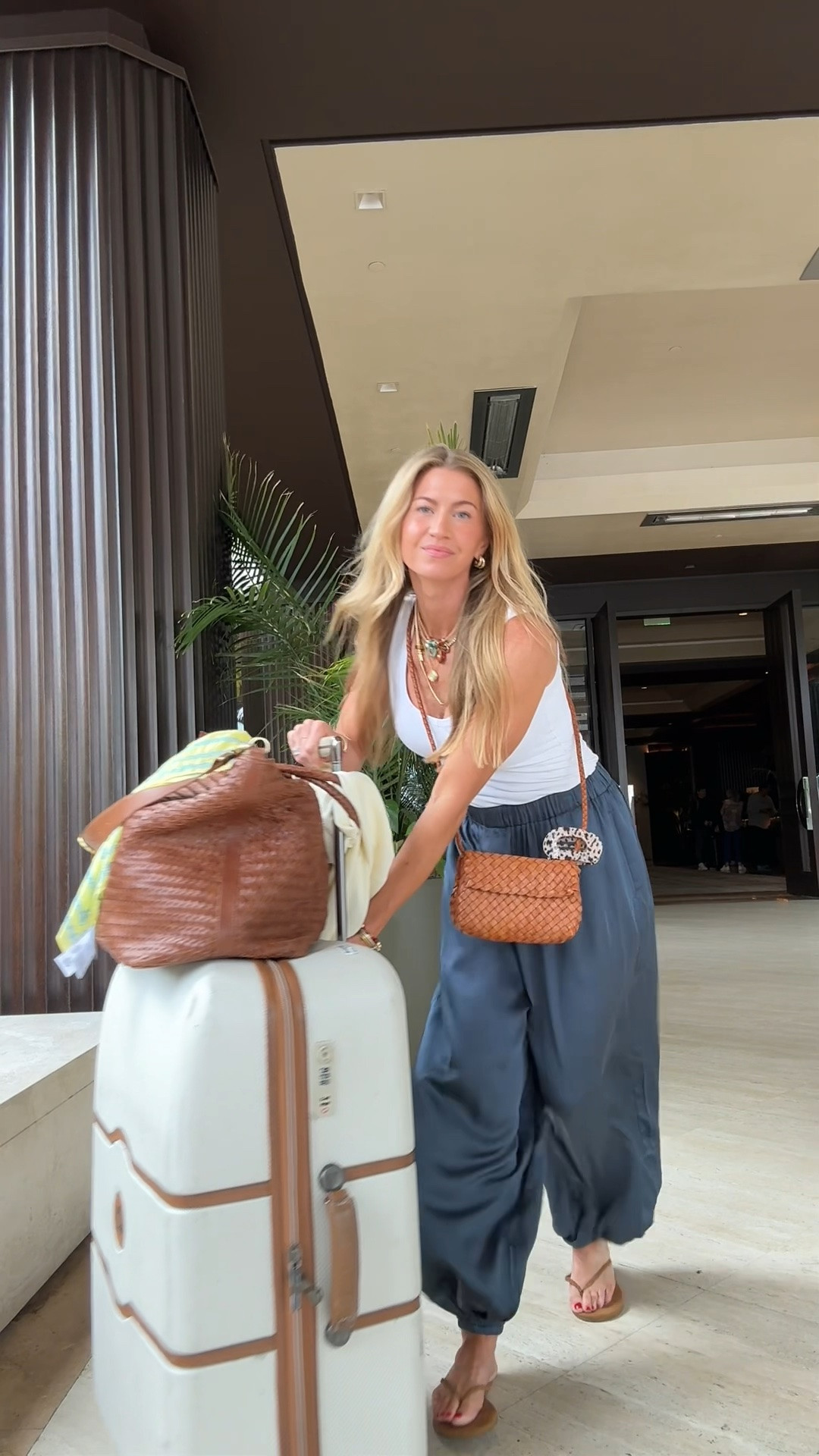 Travel outfit. 

Navy silk balloon pants: TTS, wearing XS
White tank: TTS, wearing XS

#LTKootd #LTKTravel #LTKgrwm