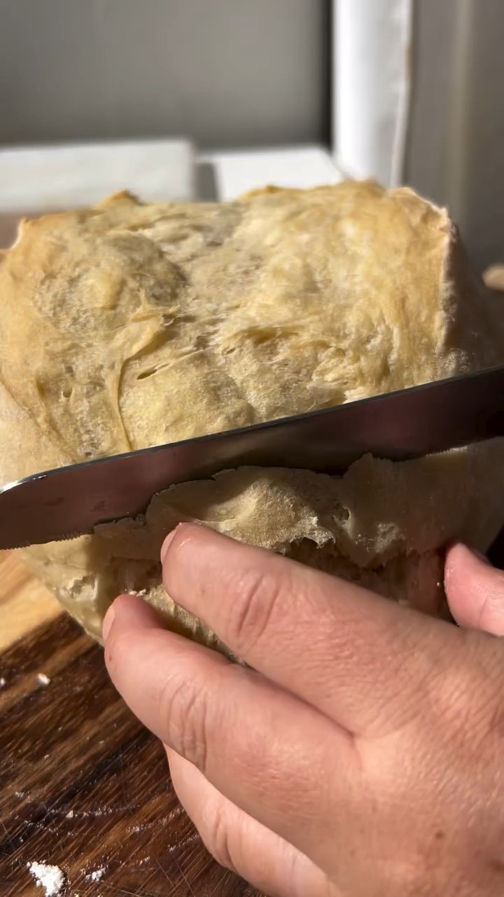 One of my goals for 2026 was to not buy any bread, so better late than never right? But I don’t always have time to make sourdough over 2 days, so I have been testing a new bread recipe.

Ive finally perfected the simple sandwich loaf…

2 3/4C flour (I use organic all purpose)
1 1/2C lukewarm water
2 tsp dry active yeast
2 tsp sea salt

1. Mix water with yeast
2. Mix in salt and flour until a ball forms
3. Cover and let it sit for 1-2 hours
4. Shape into a loaf form on a floured counter
5. Bake at 400F for 40 minutes

Seriously, so easy, so good.. and doesn’t have 45 ingredients like the bread from stores.
#homemadebread