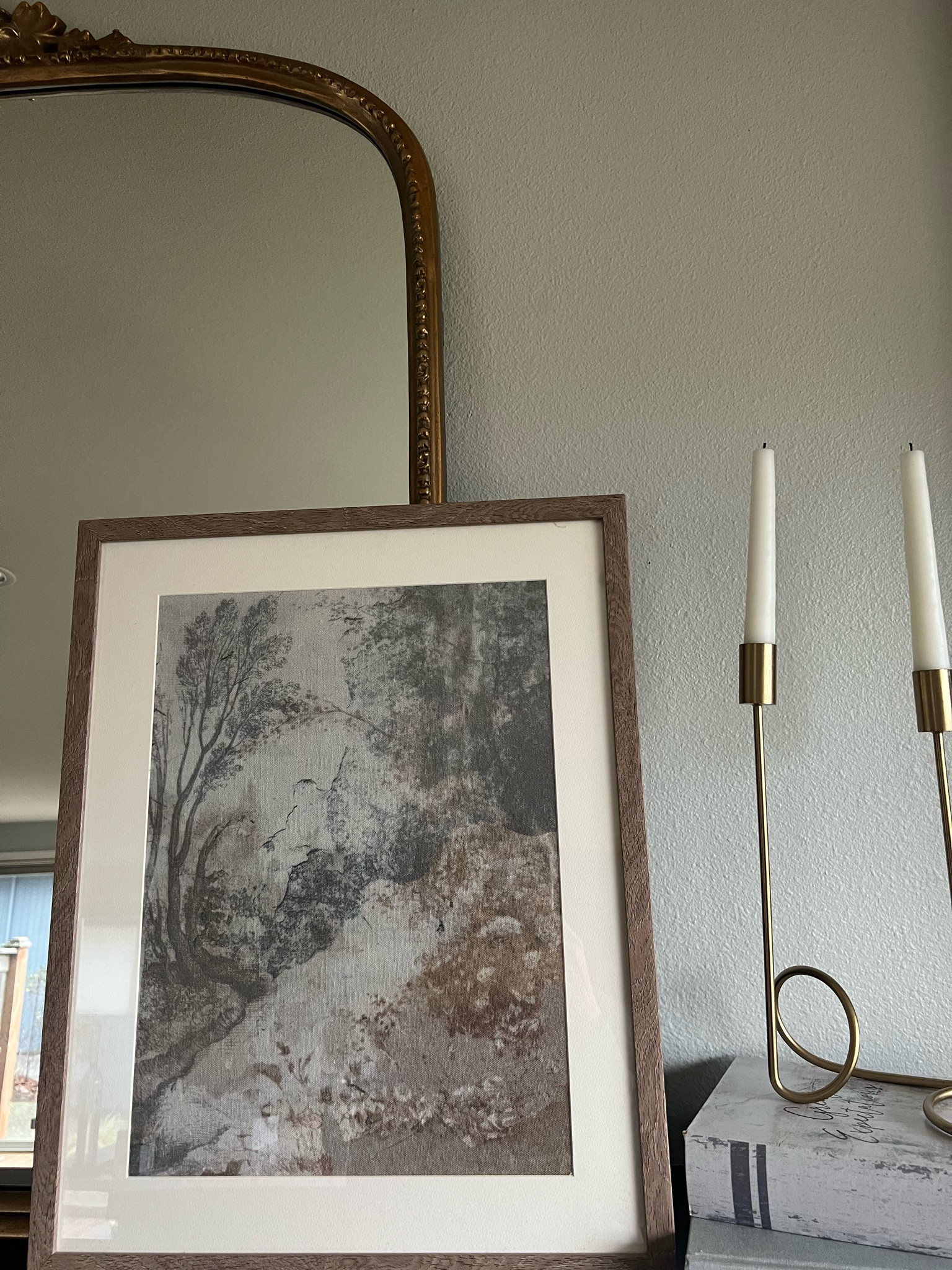 Layered mirror with art. Mantle decor. Primrose mirror from Anthropologie. Target wall art. 

#LTKunder50 #LTKhome #LTKstyletip